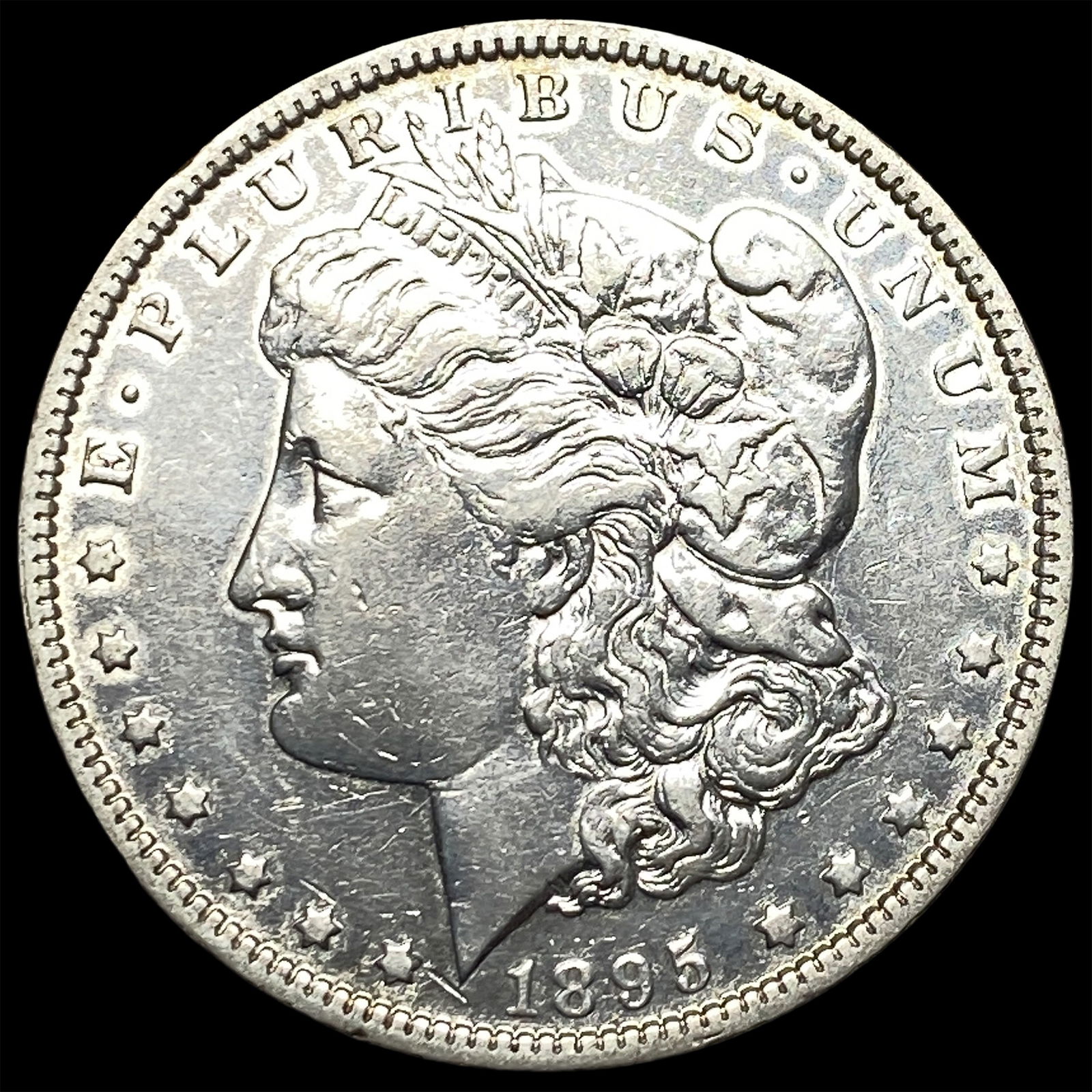 1895-O Silver Morgan Dollar NEARLY UNCIRCULATED (1 of 2)