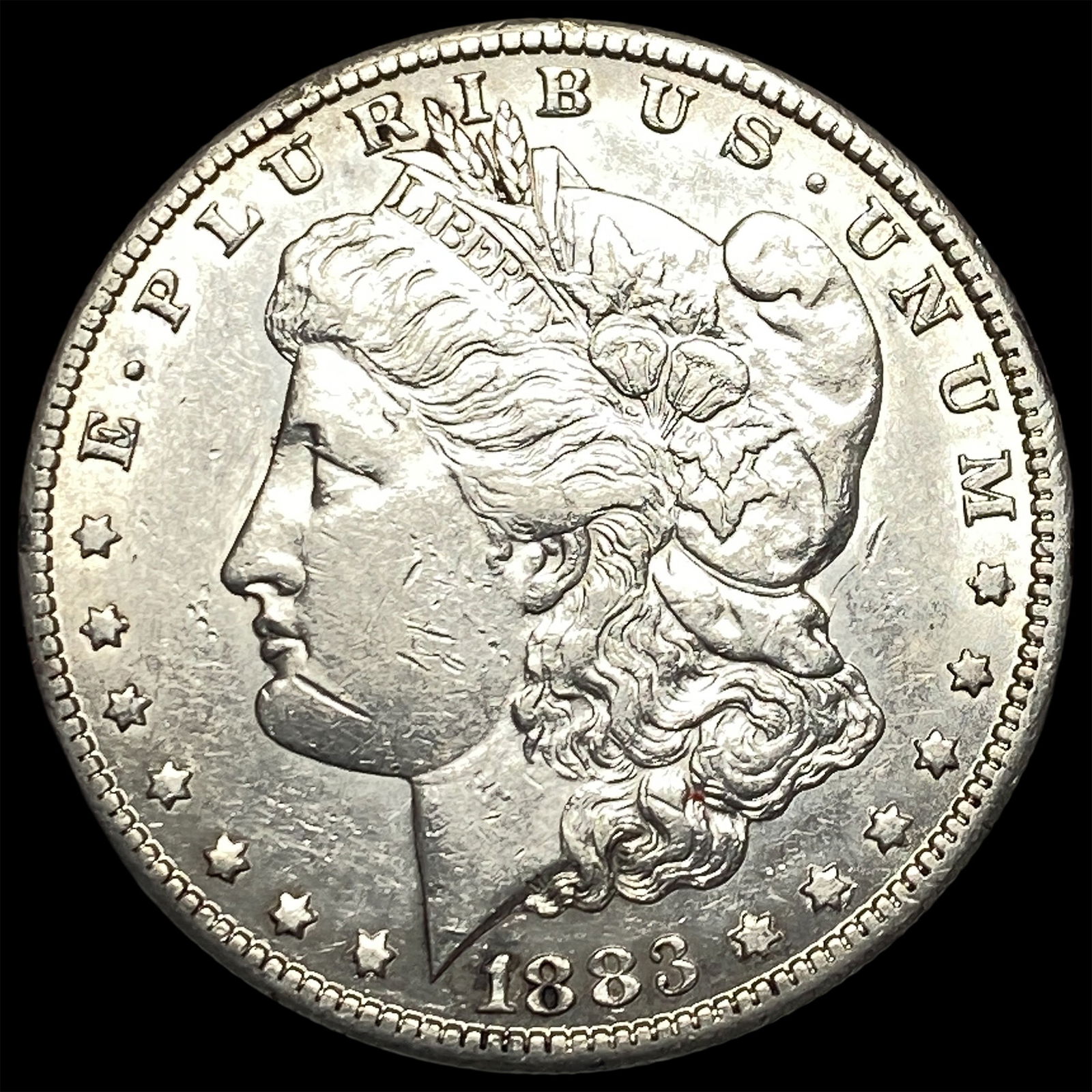 1883-O Morgan Silver Dollar CLOSELY UNCIRCULATED: 1883-O Morgan Silver Dollar CLOSELY UNCIRCULATED