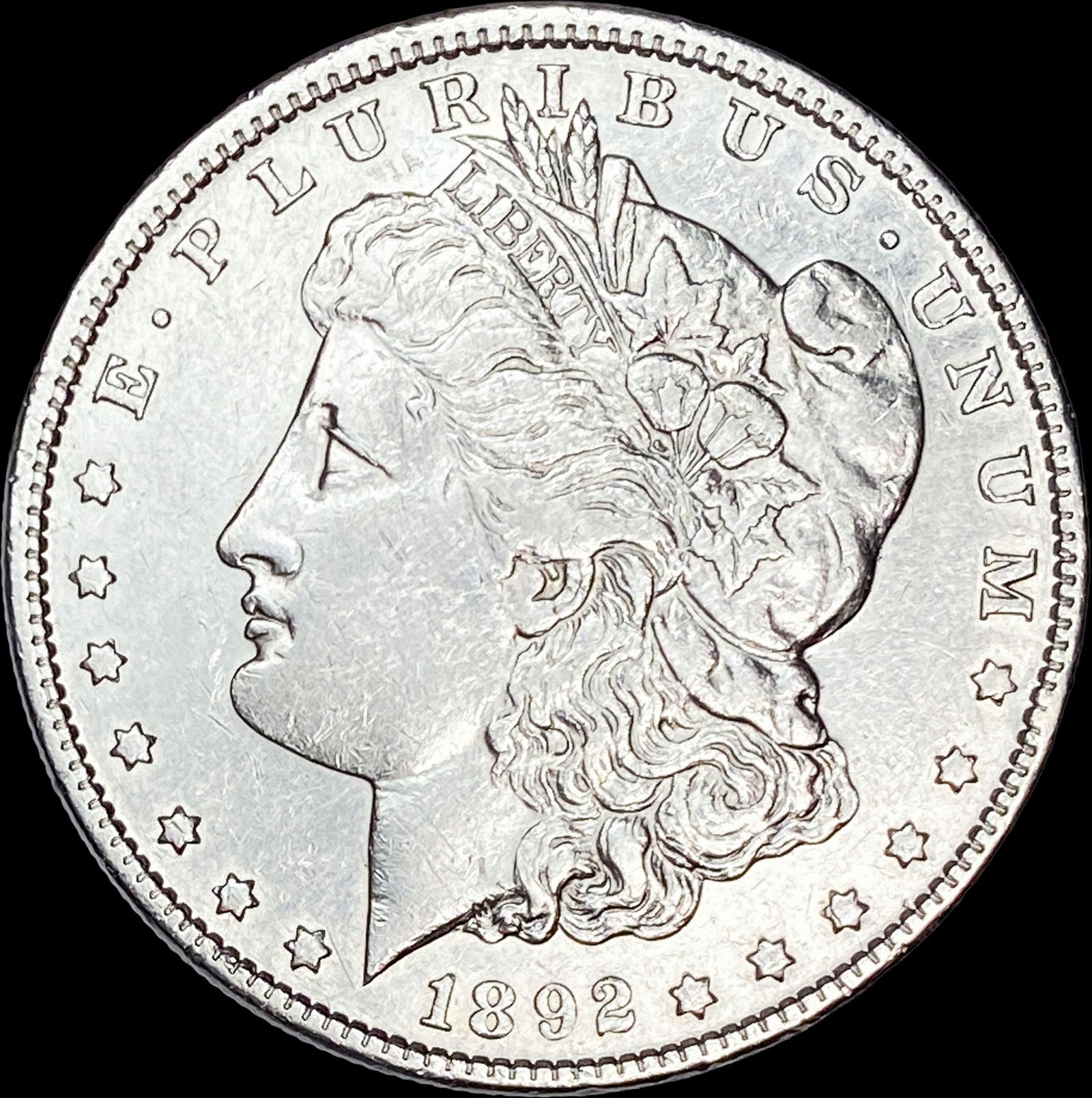 1892 Silver Dollar (Morgan Dollar) CLOSELY UNCIRCULATED: 1892 Silver Dollar (Morgan Dollar) CLOSELY UNCIRCULATED