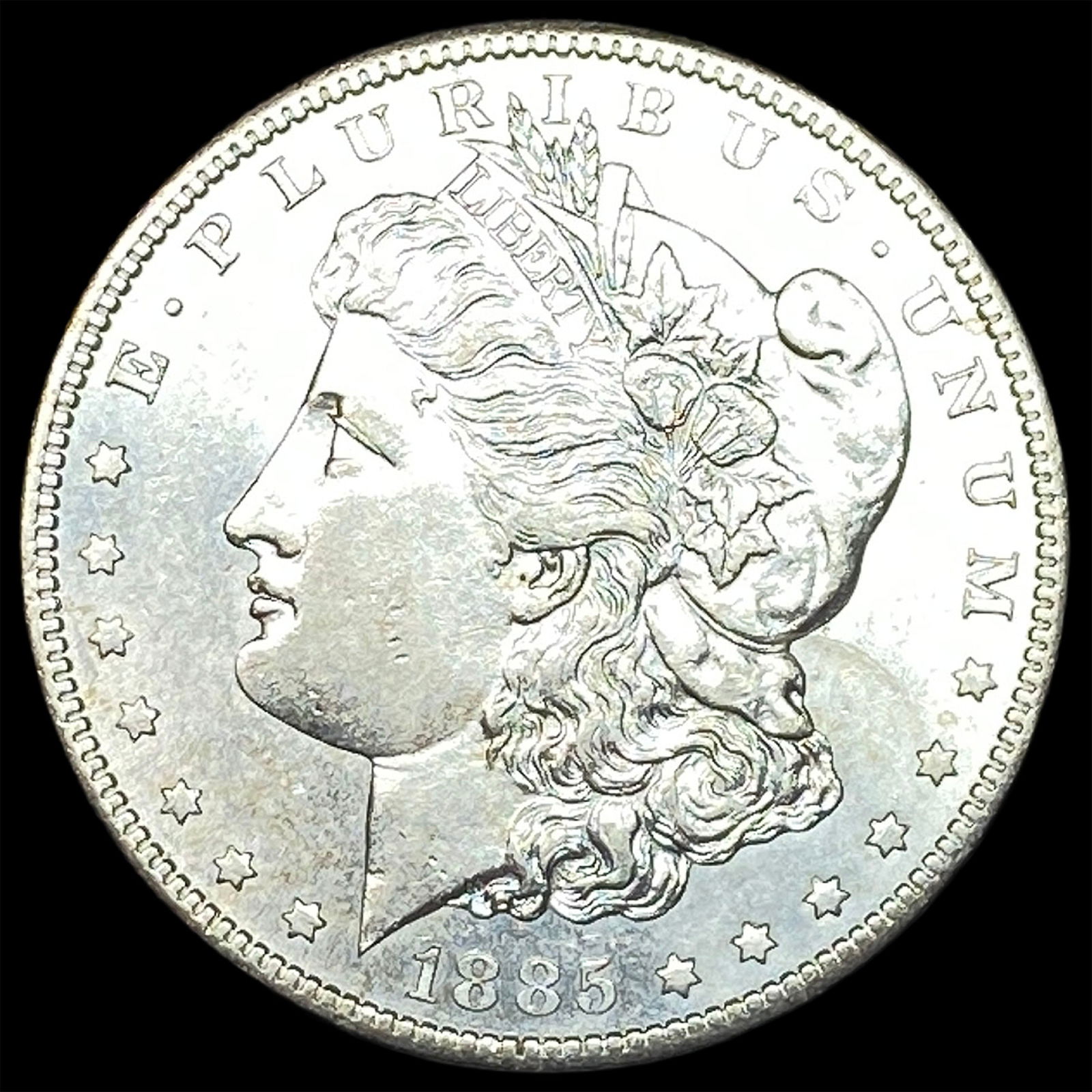 1885 Morgan Silver Dollar CLOSELY UNCIRCULATED (1 of 2)
