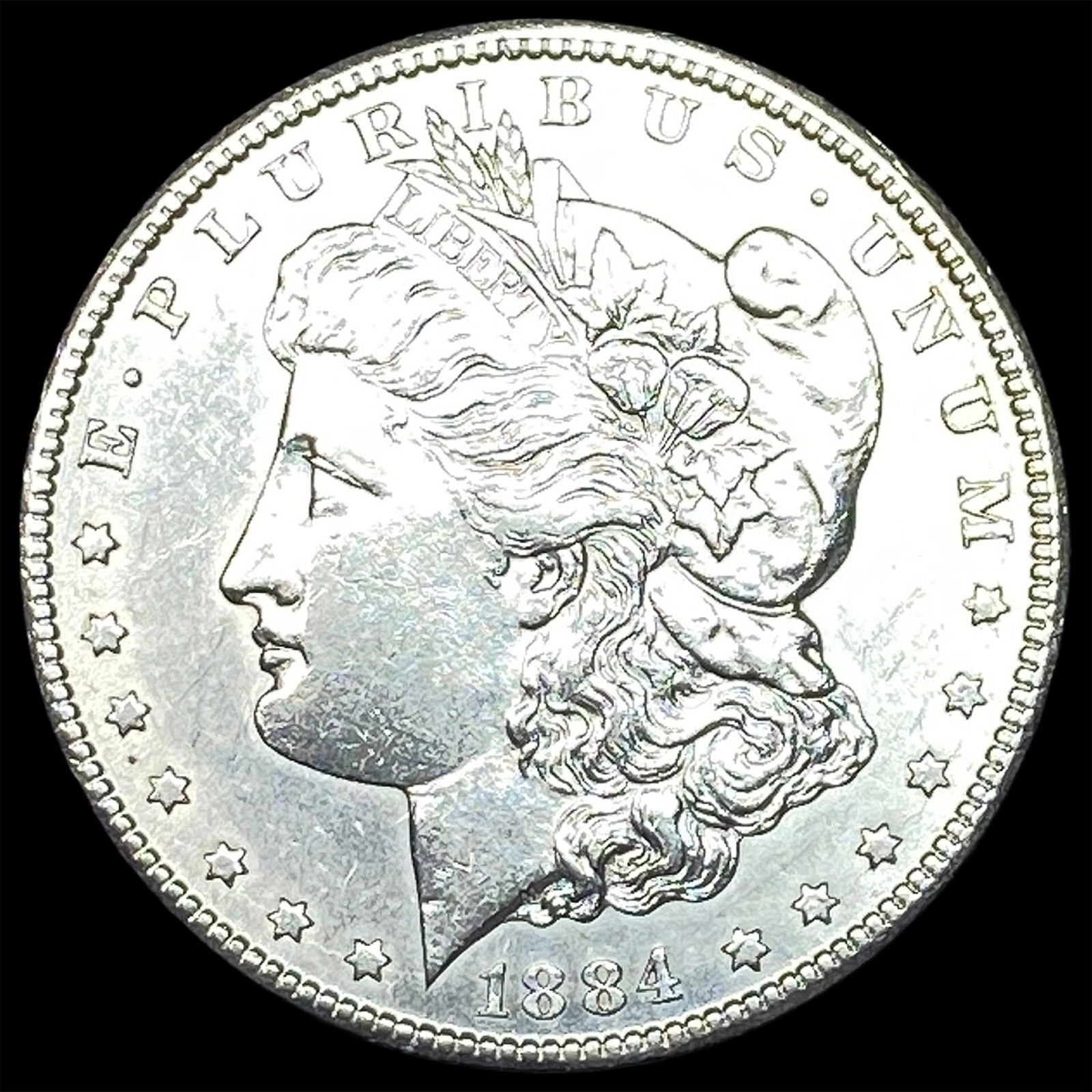 1884-CC Silver Morgan Dollar CLOSELY UNCIRCULATED (1 of 2)