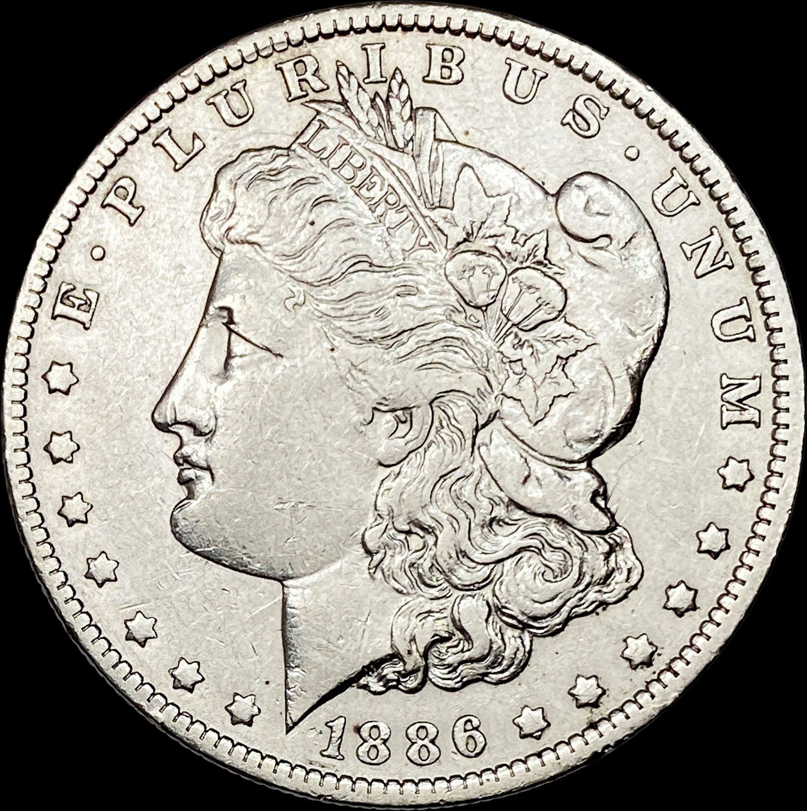 1886-O Silver Morgan Dollar NEARLY UNCIRCULATED: 1886-O Silver Morgan Dollar NEARLY UNCIRCULATED