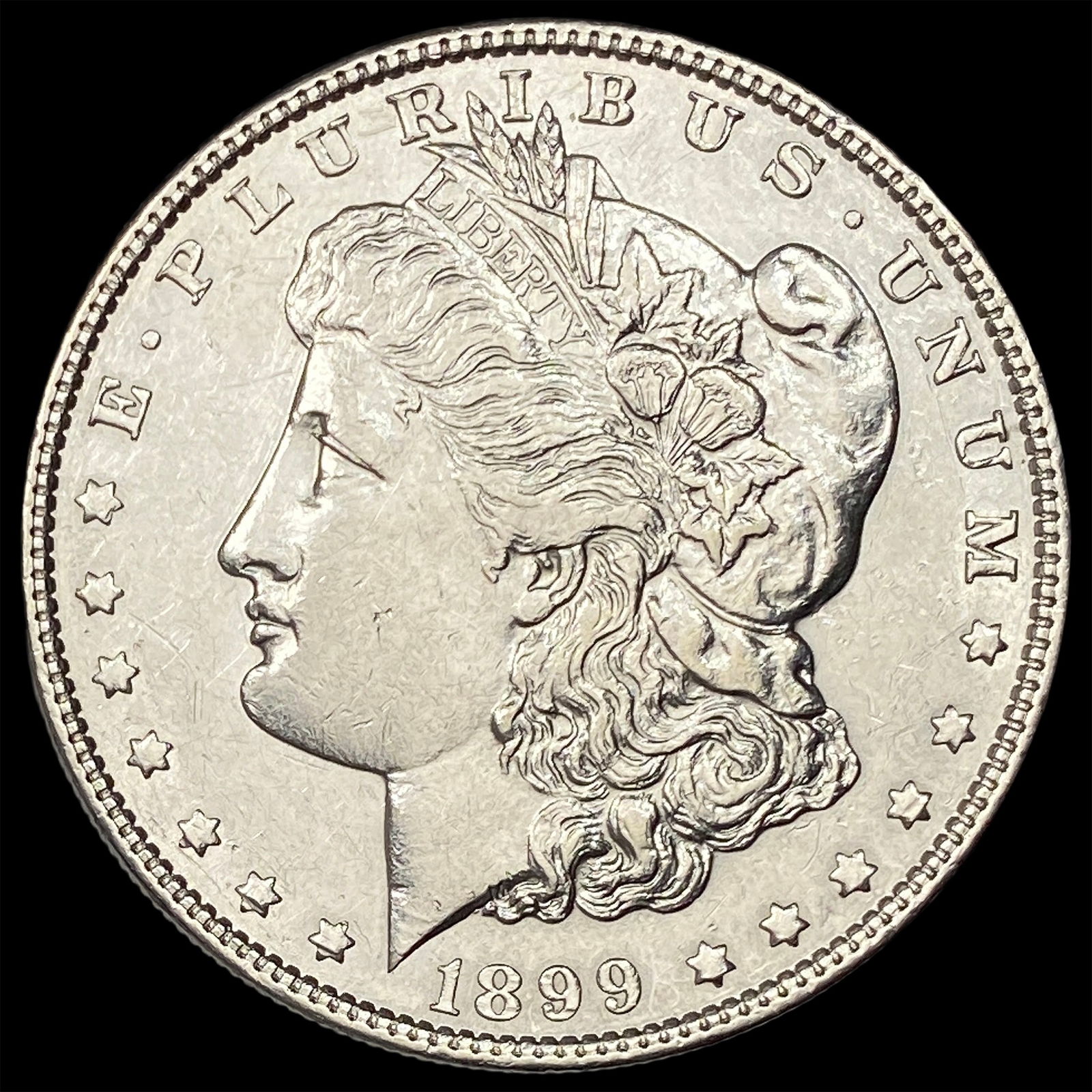1899 Silver Morgan Dollar CLOSELY UNCIRCULATED: 1899 Silver Morgan Dollar CLOSELY UNCIRCULATED