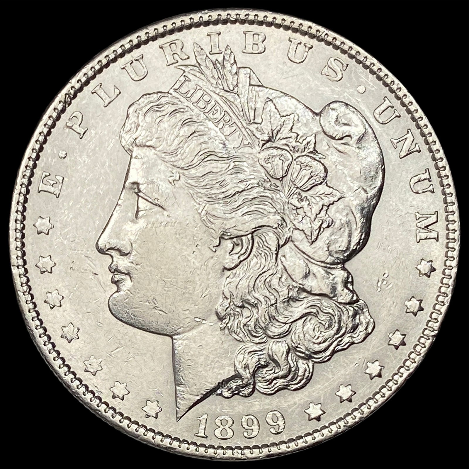 1899 Silver Morgan Dollar CLOSELY UNCIRCULATED: 1899 Silver Morgan Dollar CLOSELY UNCIRCULATED