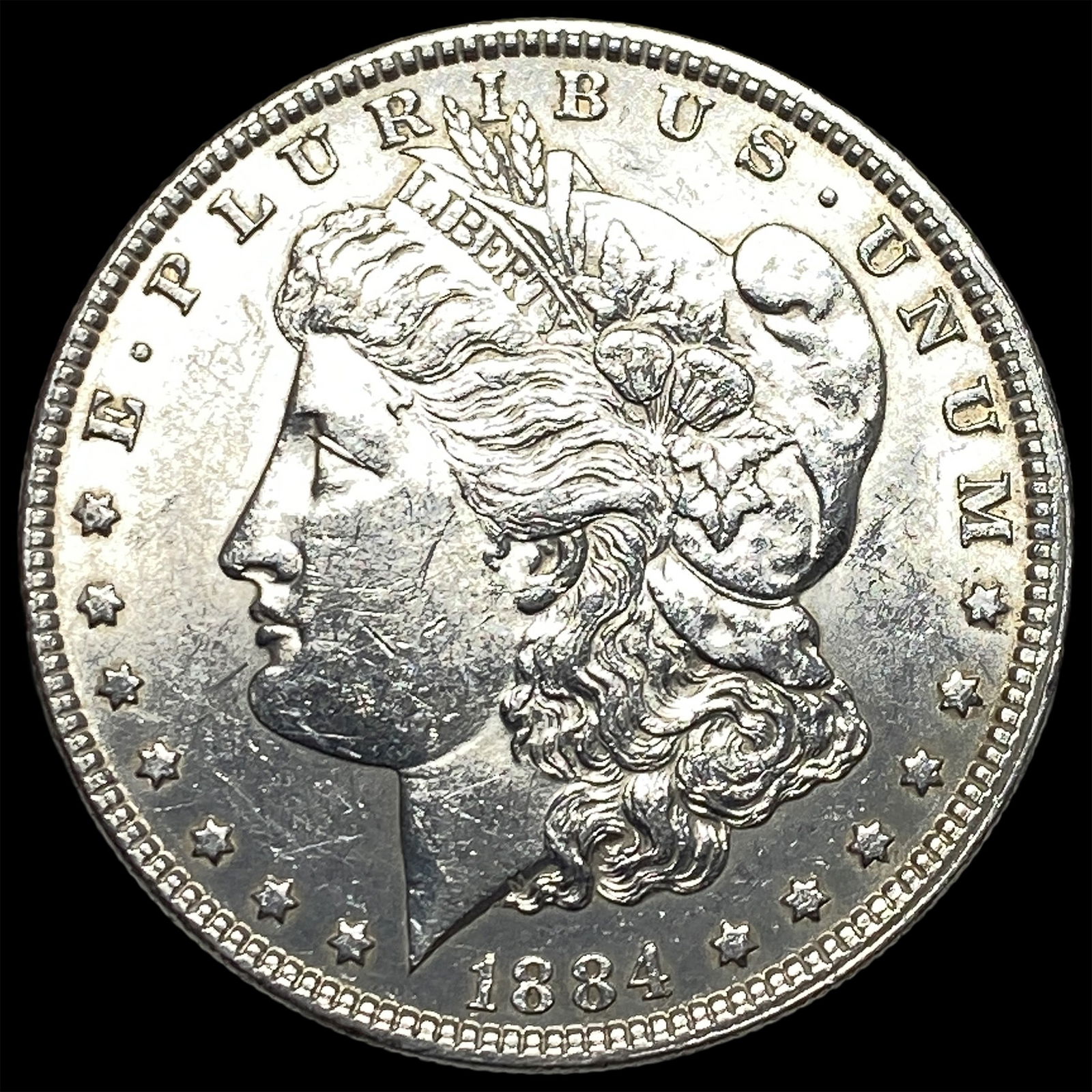 1884 Morgan Silver Dollar CLOSELY UNCIRCULATED (1 of 2)