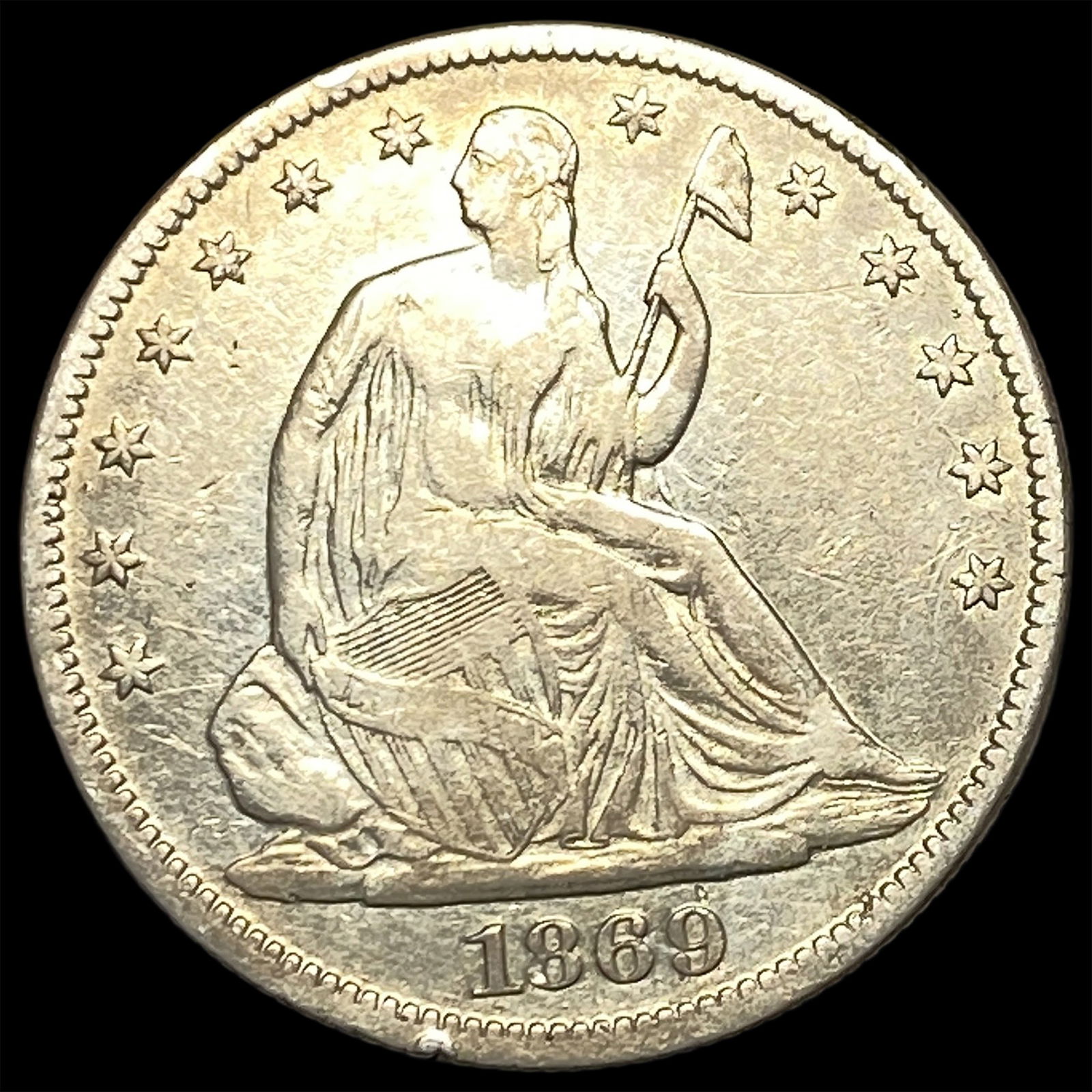1869 Seated Liberty Half Dollar ABOUT UNCIRCULATED: 1869 Seated Liberty Half Dollar ABOUT UNCIRCULATED