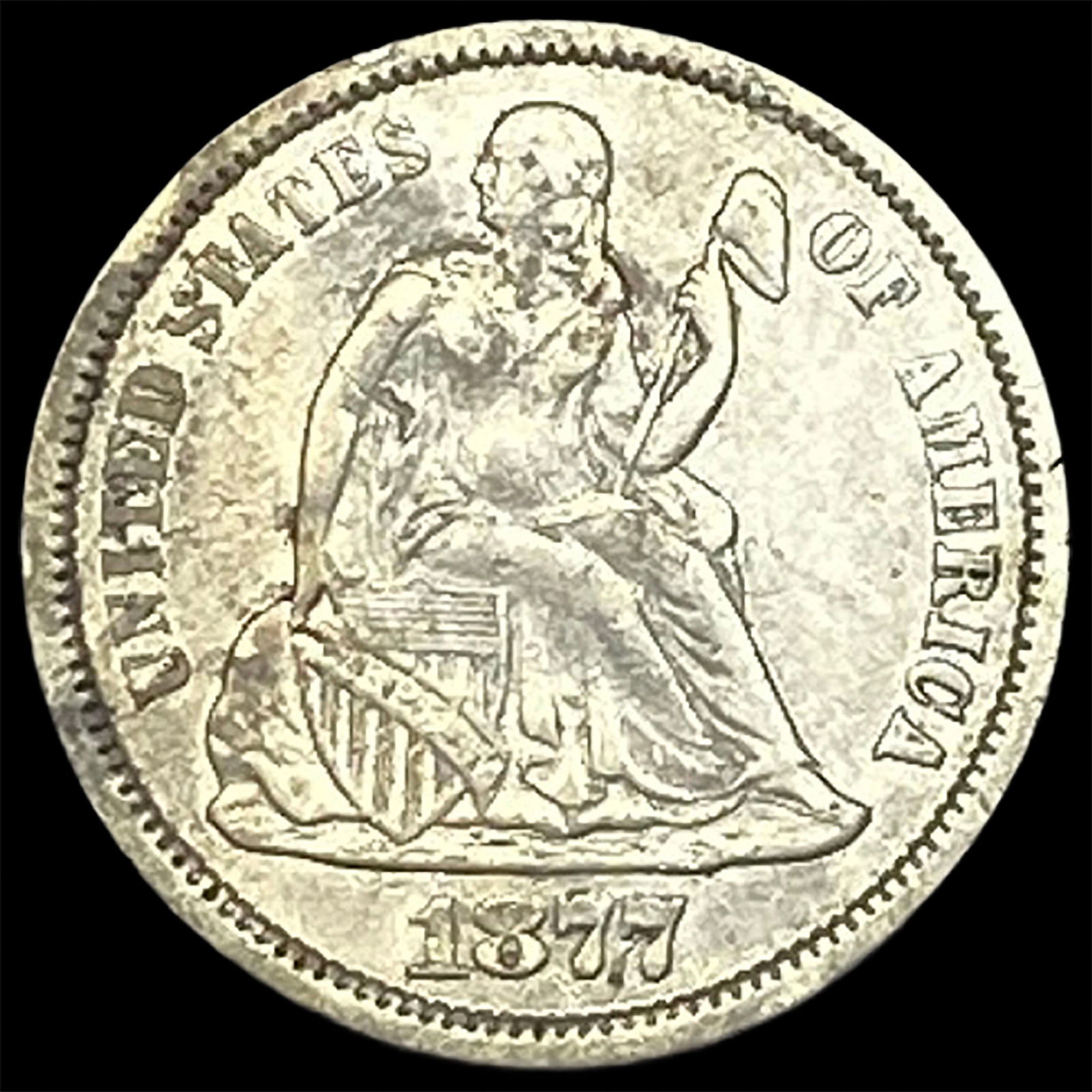 1877-CC Silver Seated Liberty Dime NEARLY UNCIRCULATED (1 of 2)