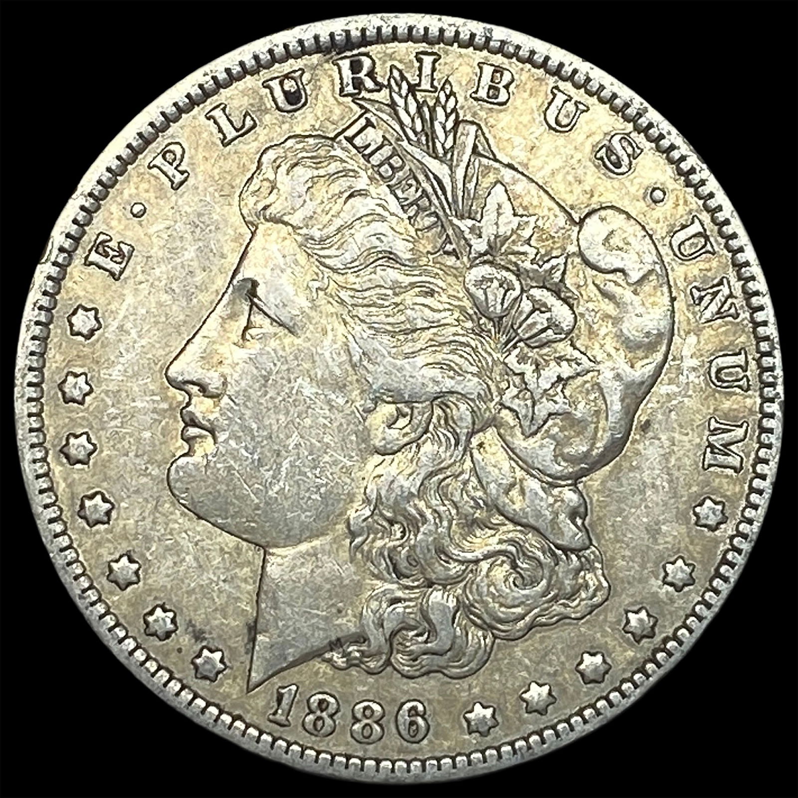 1886-O Silver Morgan Dollar NEARLY UNCIRCULATED: 1886-O Silver Morgan Dollar NEARLY UNCIRCULATED