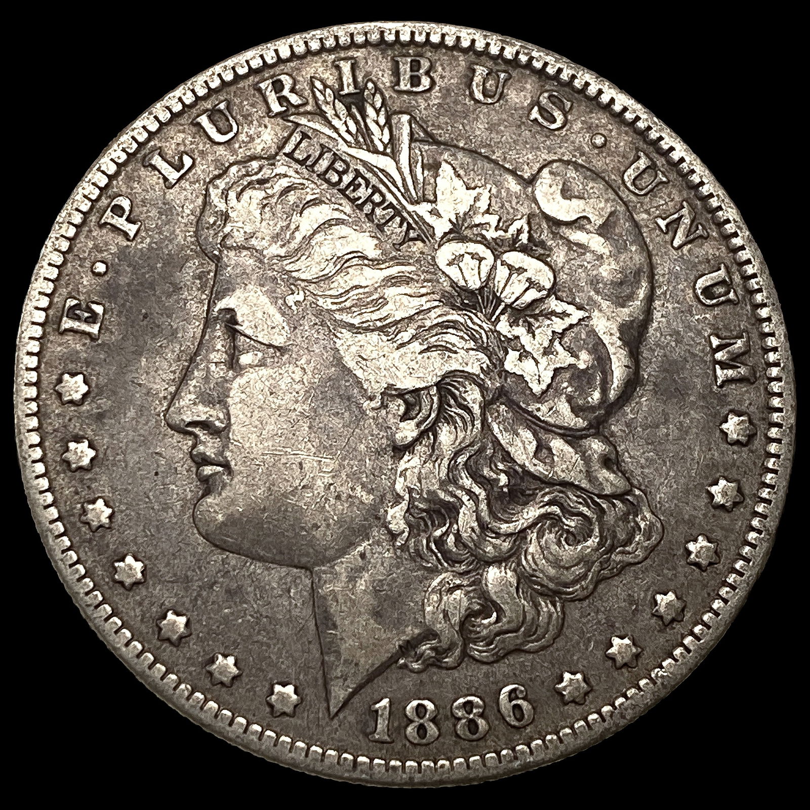 1886-O Silver Morgan Dollar CLOSELY UNCIRCULATED: 1886-O Silver Morgan Dollar CLOSELY UNCIRCULATED