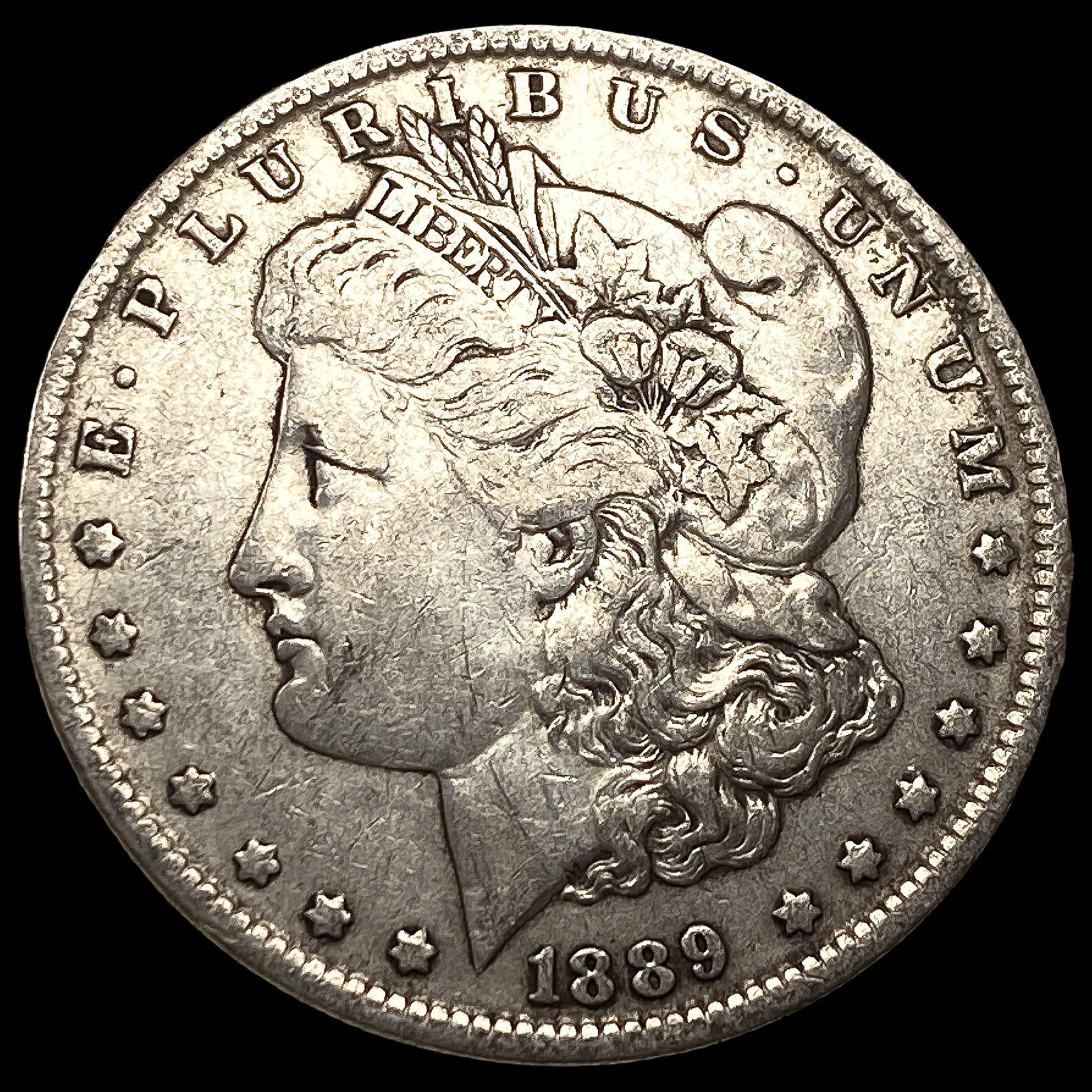 1889-O Morgan Silver Dollar NEARLY UNCIRCULATED (1 of 2)