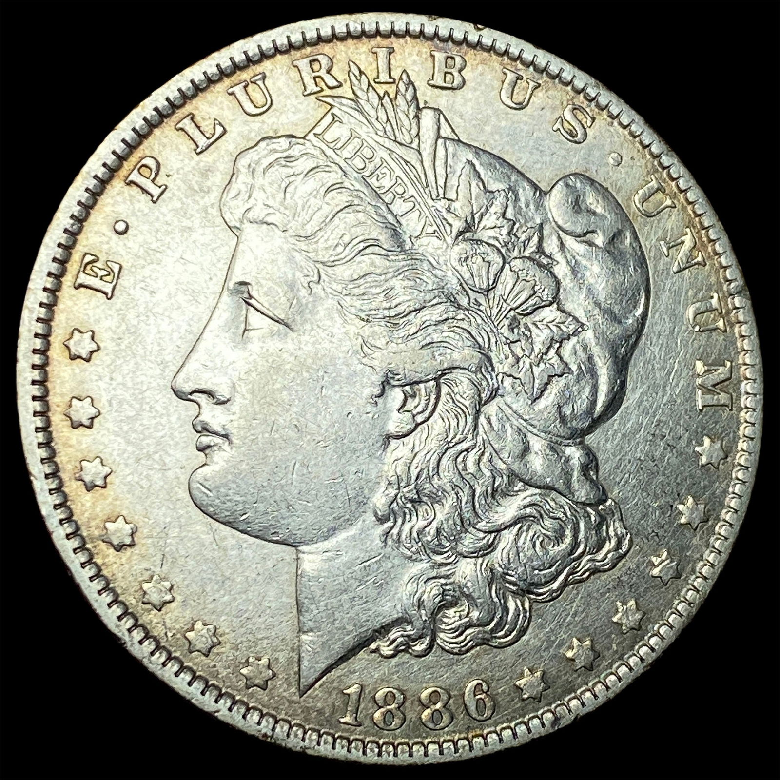 1886-O Silver Morgan Dollar CLOSELY UNCIRCULATED (1 of 2)