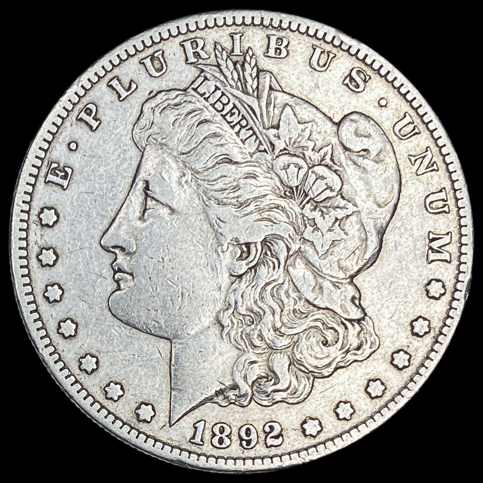 1892-S Silver Morgan Dollar NEARLY UNCIRCULATED (1 of 2)