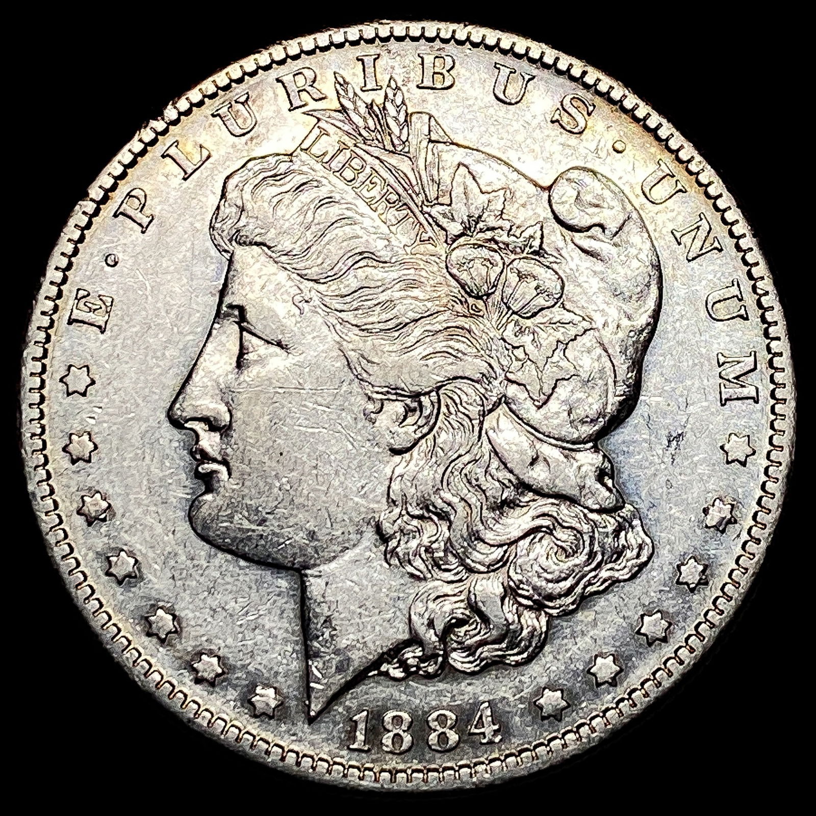 1884-S Silver Morgan Dollar ABOUT UNCIRCULATED: 1884-S Silver Morgan Dollar ABOUT UNCIRCULATED