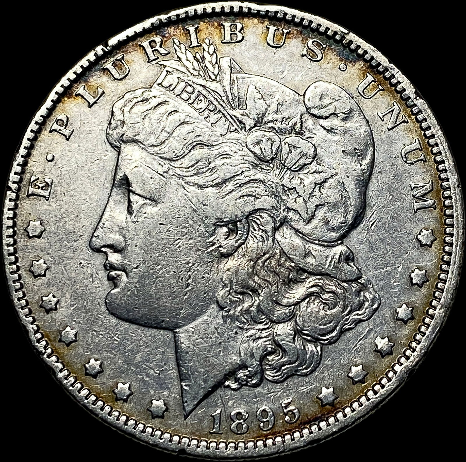 1895-O Silver Morgan Dollar NEARLY UNCIRCULATED (1 of 2)