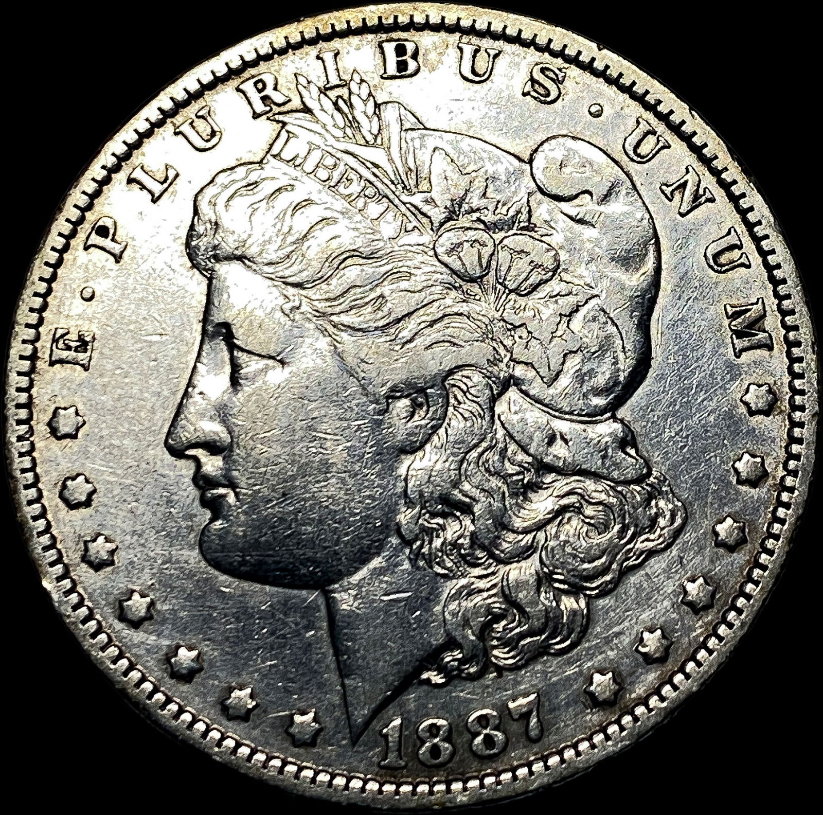 1887-O Silver Morgan Dollar CLOSELY UNCIRCULATED (1 of 2)