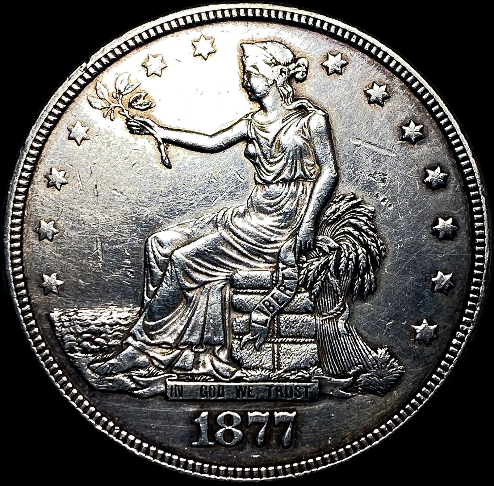 1877 Silver Trade Dollar CLOSELY UNCIRCULATED (1 of 2)