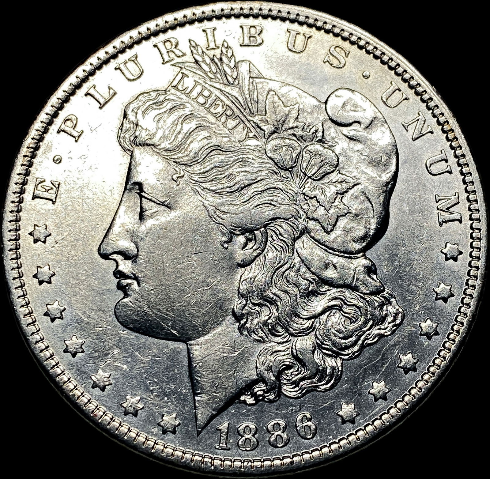 1886 Morgan Silver Dollar CLOSELY UNCIRCULATED (1 of 2)