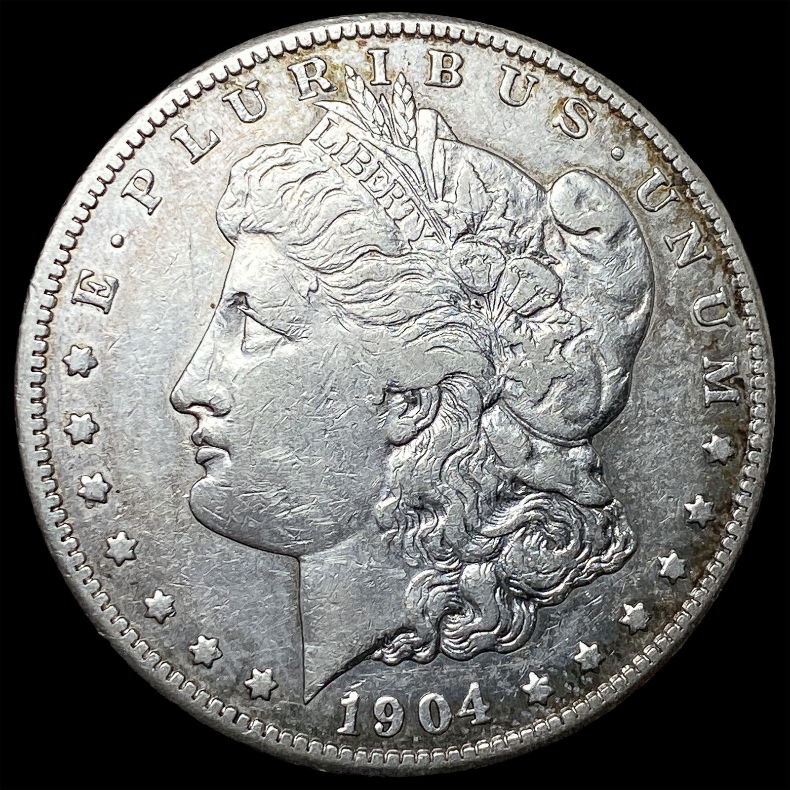 1904-S Silver Morgan Dollar ABOUT UNCIRCULATED: 1904-S Silver Morgan Dollar ABOUT UNCIRCULATED