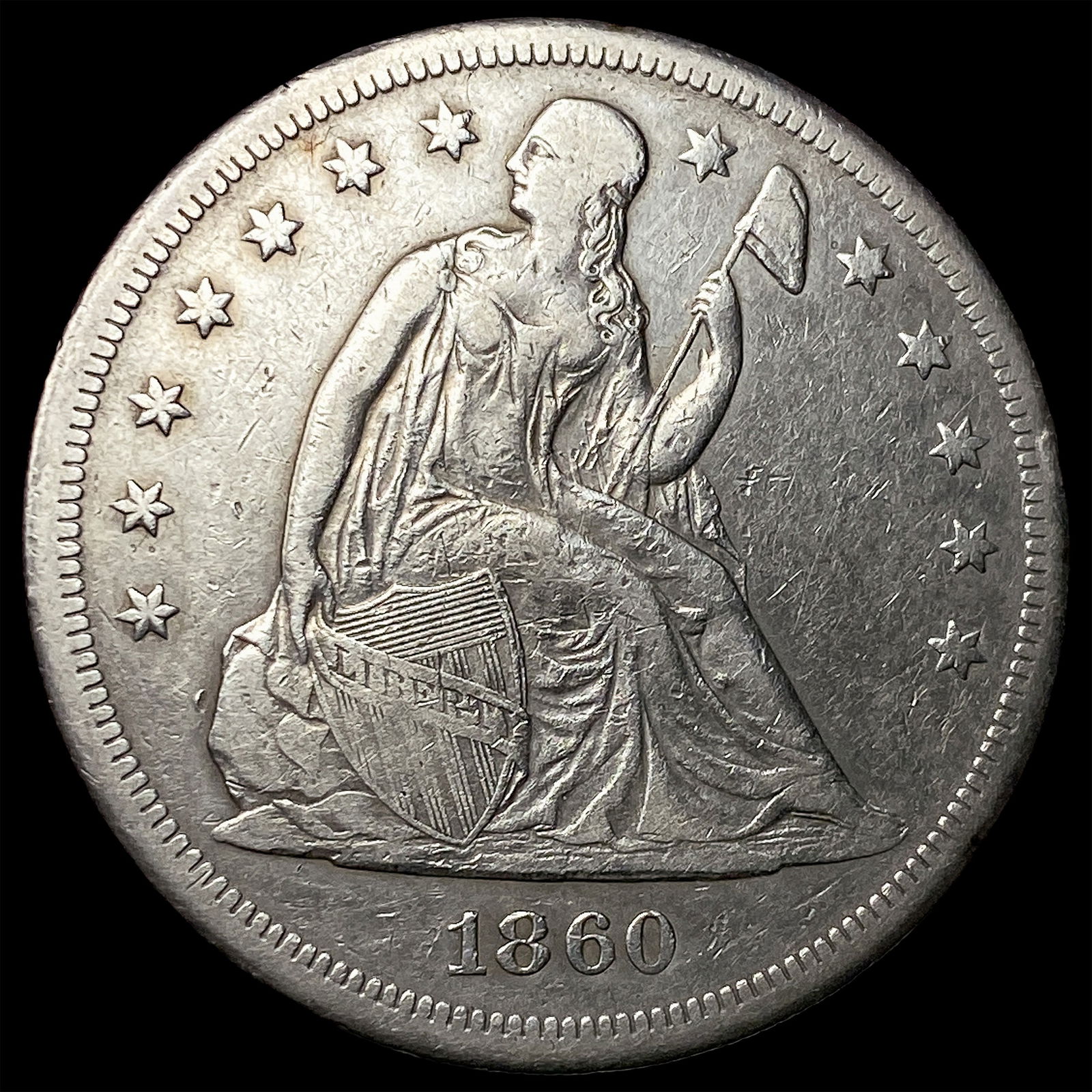 1860-O Silver Seated Liberty Dollar CLOSELY UNCIRCULATED: 1860-O Silver Seated Liberty Dollar CLOSELY UNCIRCULATED