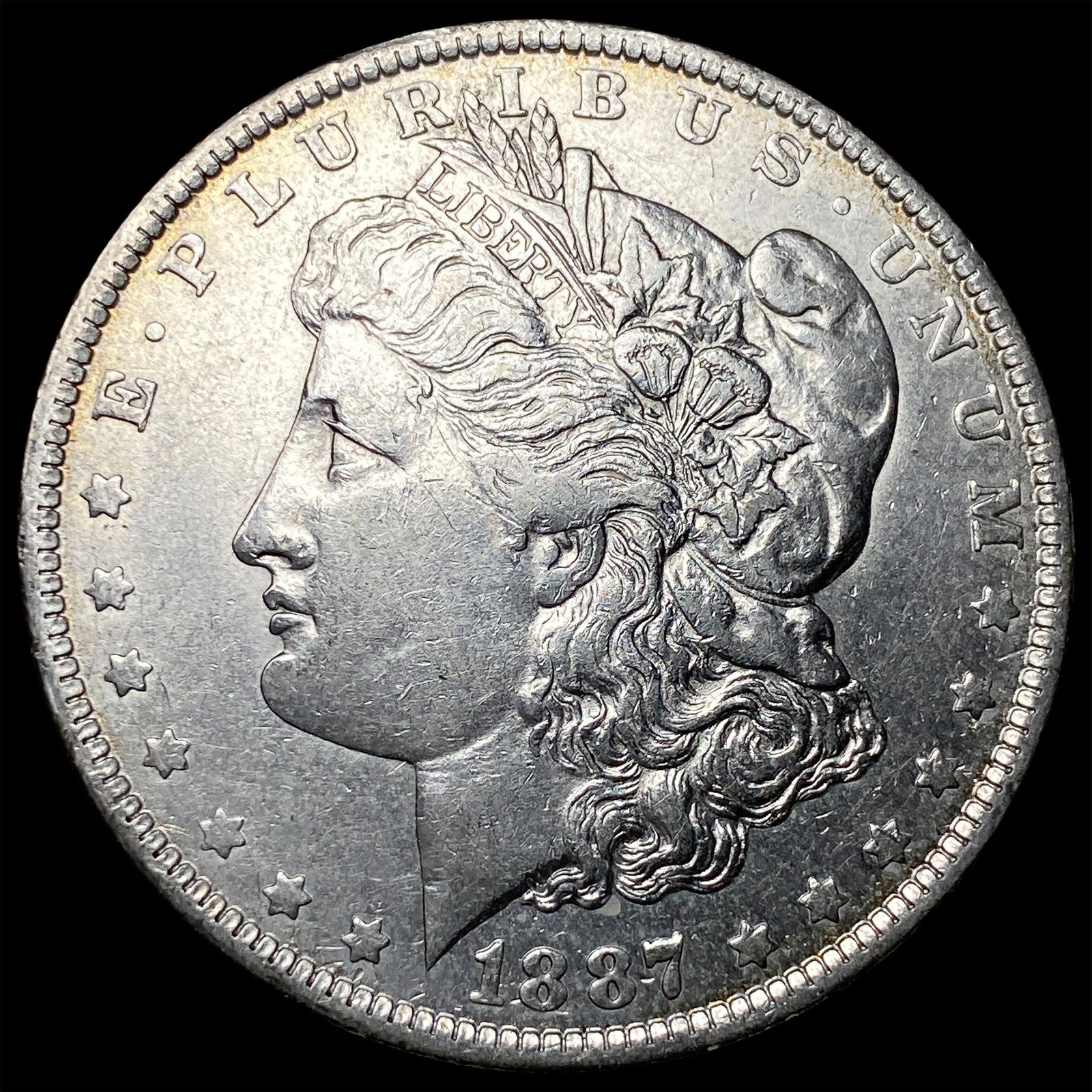 1887-O Silver Morgan Dollar CLOSELY UNCIRCULATED (1 of 2)