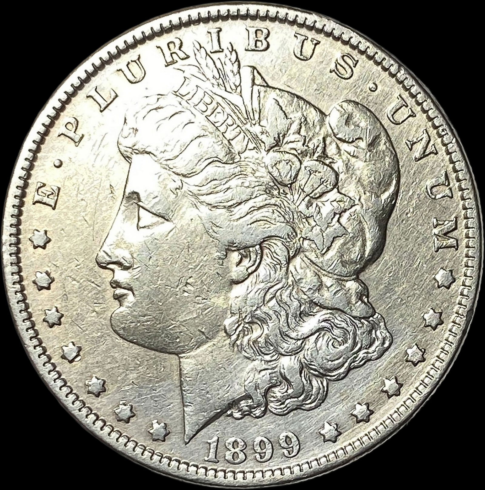 1899 Morgan Silver Dollar CLOSELY UNCIRCULATED (1 of 2)