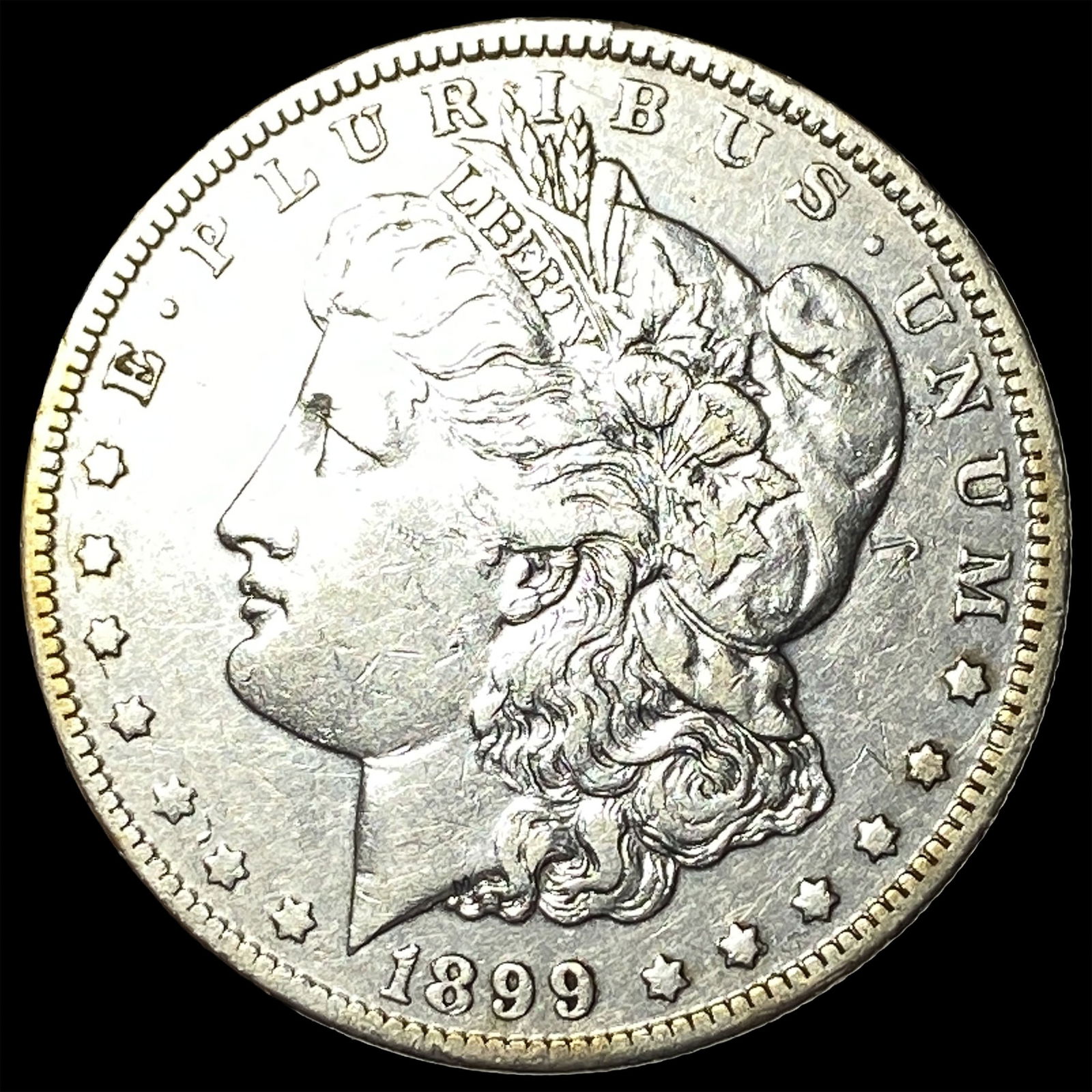 1899-O Silver Morgan Dollar NEARLY UNCIRCULATED (1 of 2)