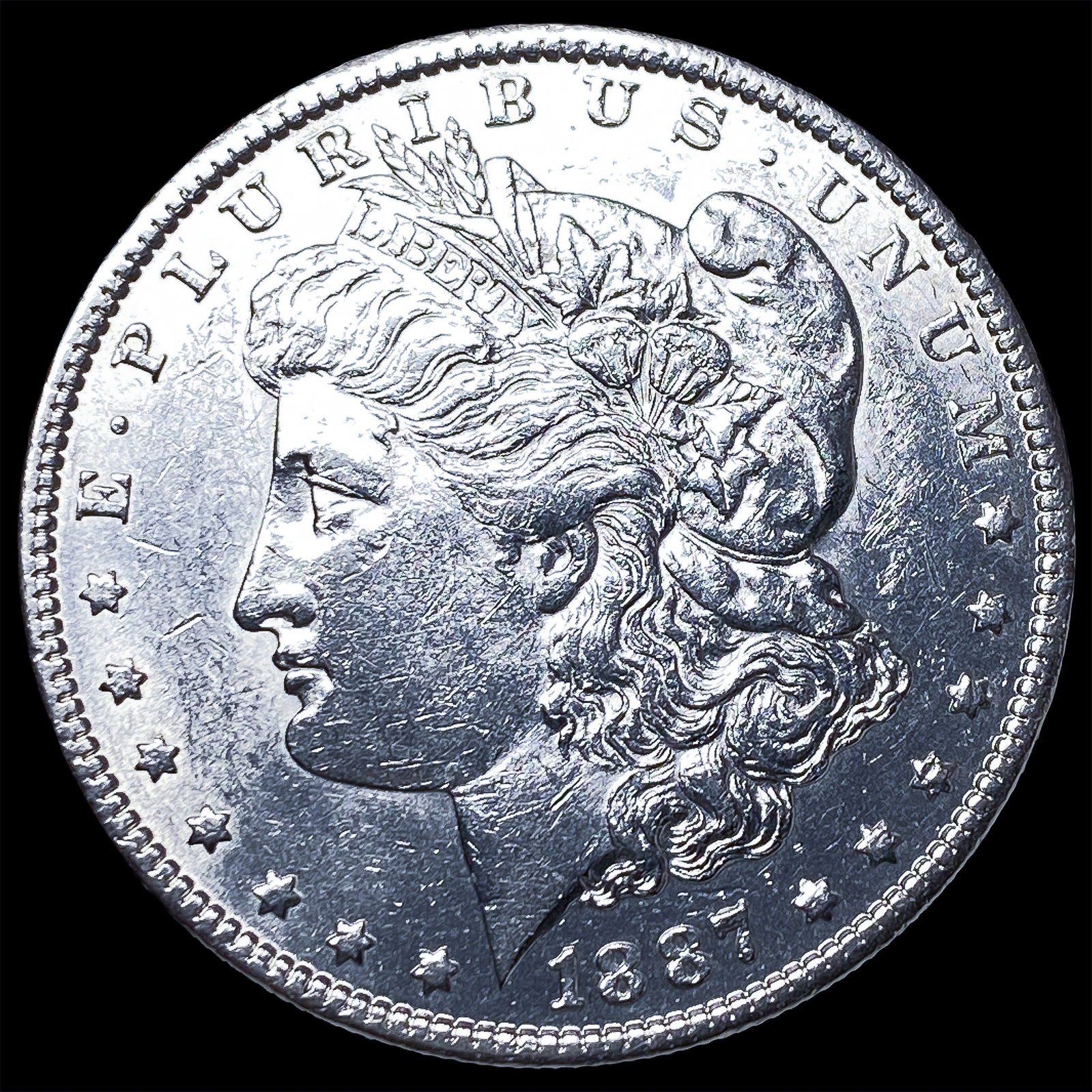 1887-O Morgan Silver Dollar CLOSELY UNCIRCULATED: 1887-O Morgan Silver Dollar CLOSELY UNCIRCULATED