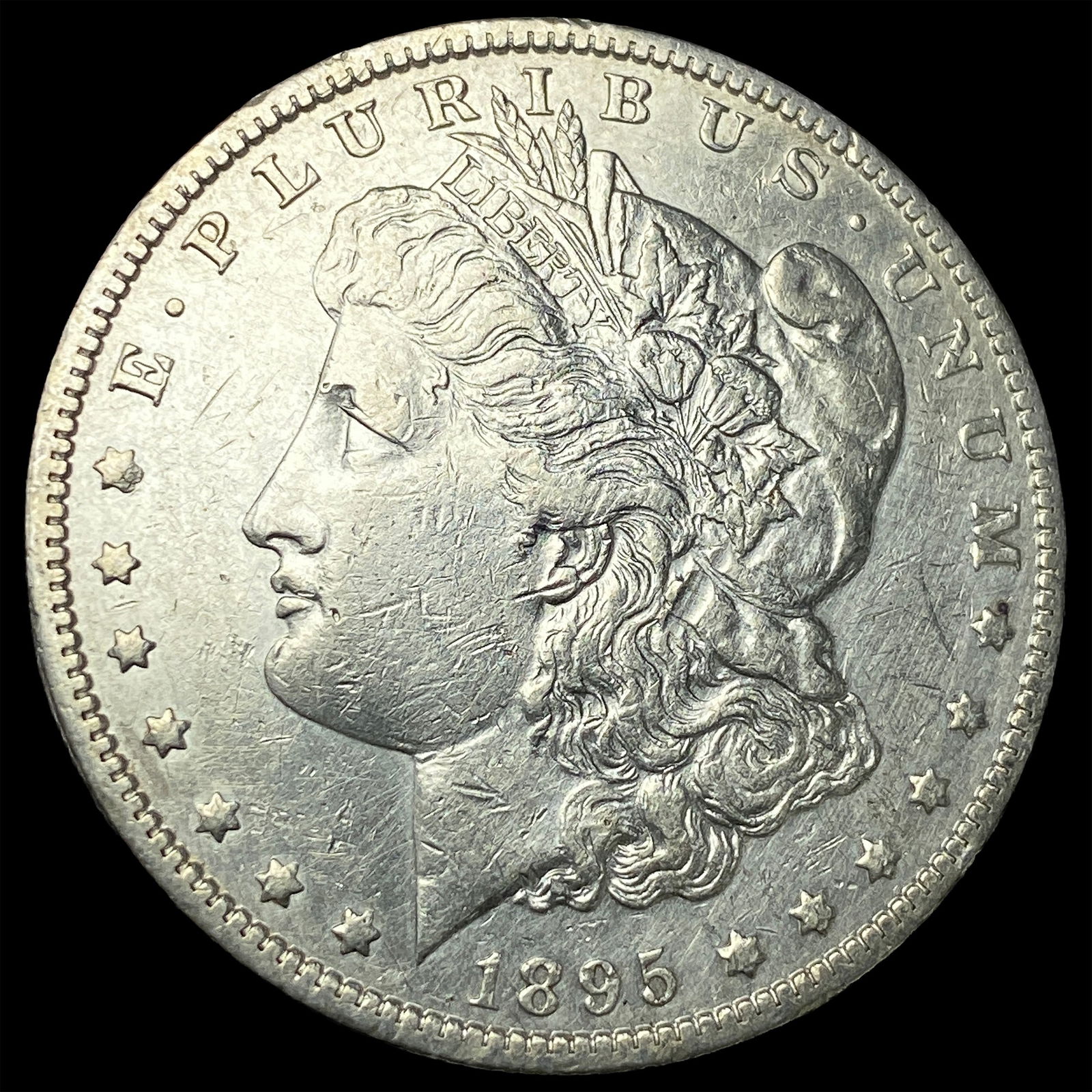 1895-O Silver Morgan Dollar NEARLY UNCIRCULATED (1 of 2)