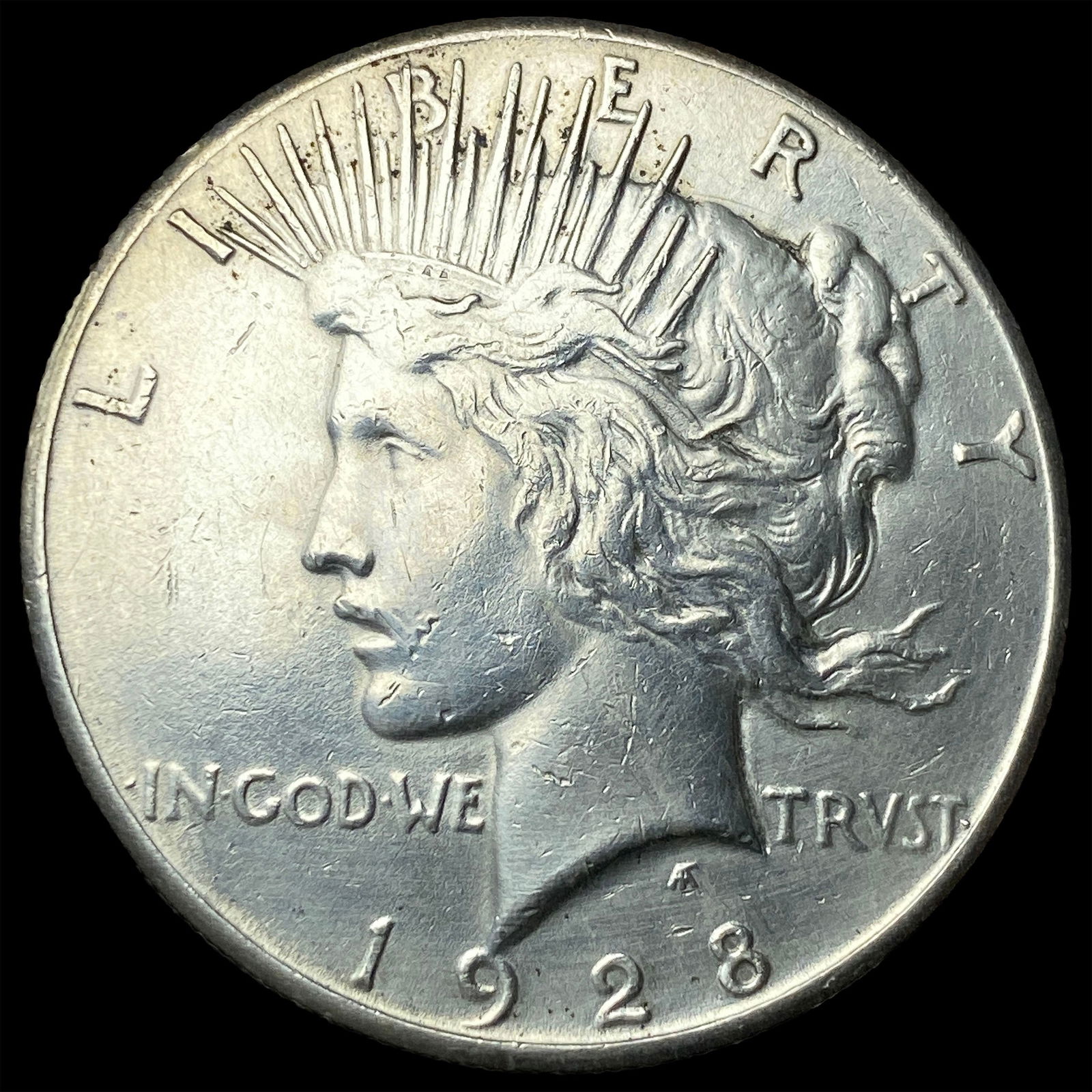 1928 Peace Silver Dollar CLOSELY UNCIRCULATED (1 of 2)