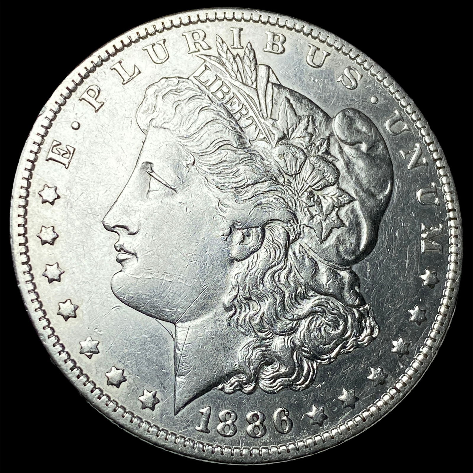 1886-O Silver Morgan Dollar CLOSELY UNCIRCULATED: 1886-O Silver Morgan Dollar CLOSELY UNCIRCULATED
