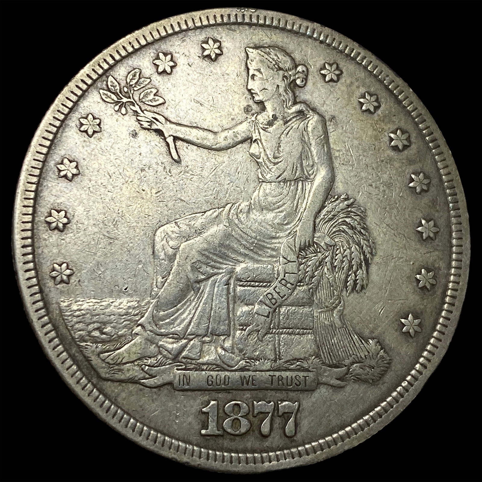 1877 Silver Trade Dollar NEARLY UNCIRCULATED (1 of 2)