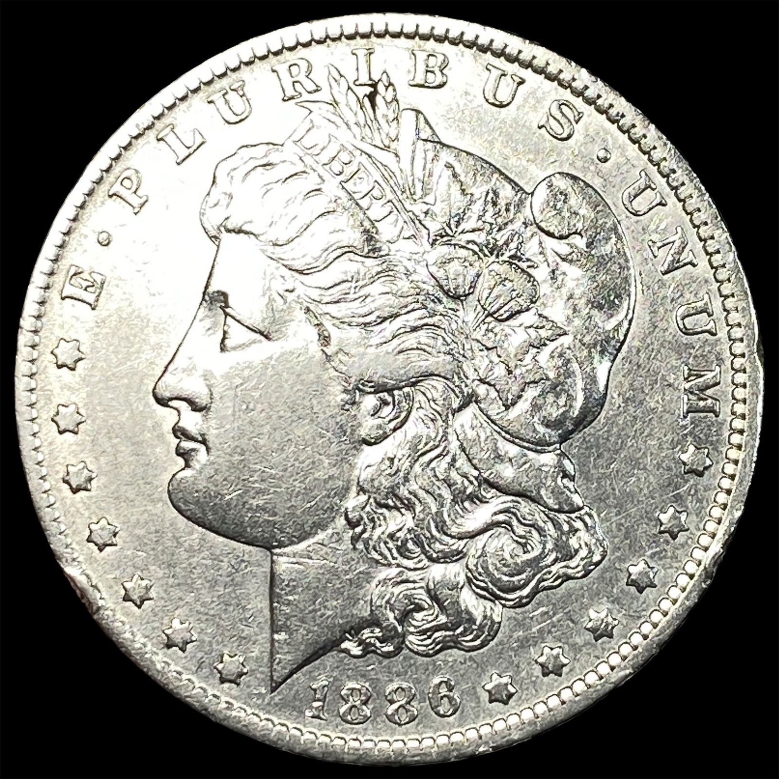 1886-O Silver Morgan Dollar NEARLY UNCIRCULATED (1 of 2)