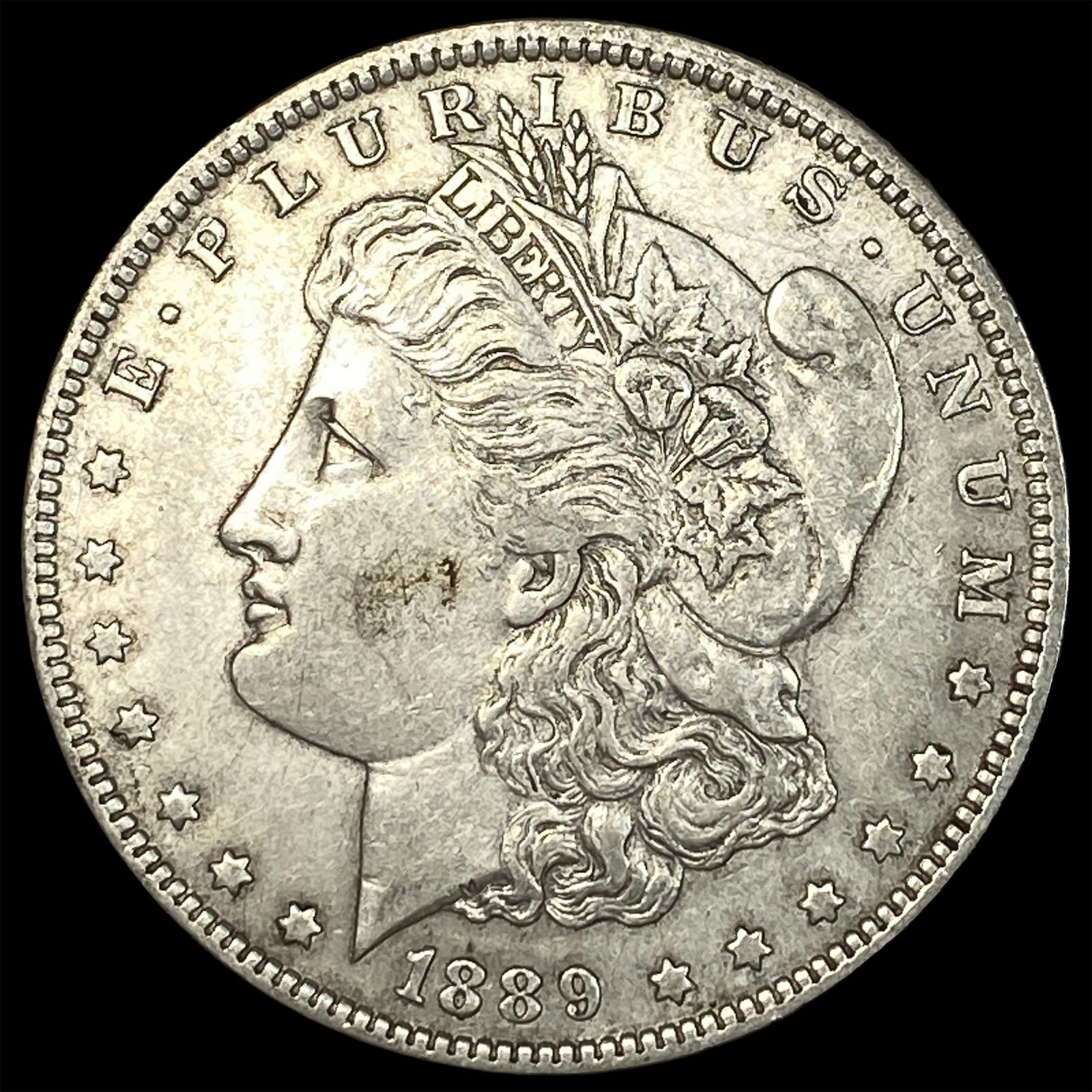1889-O Silver Morgan Dollar CLOSELY UNCIRCULATED (1 of 2)