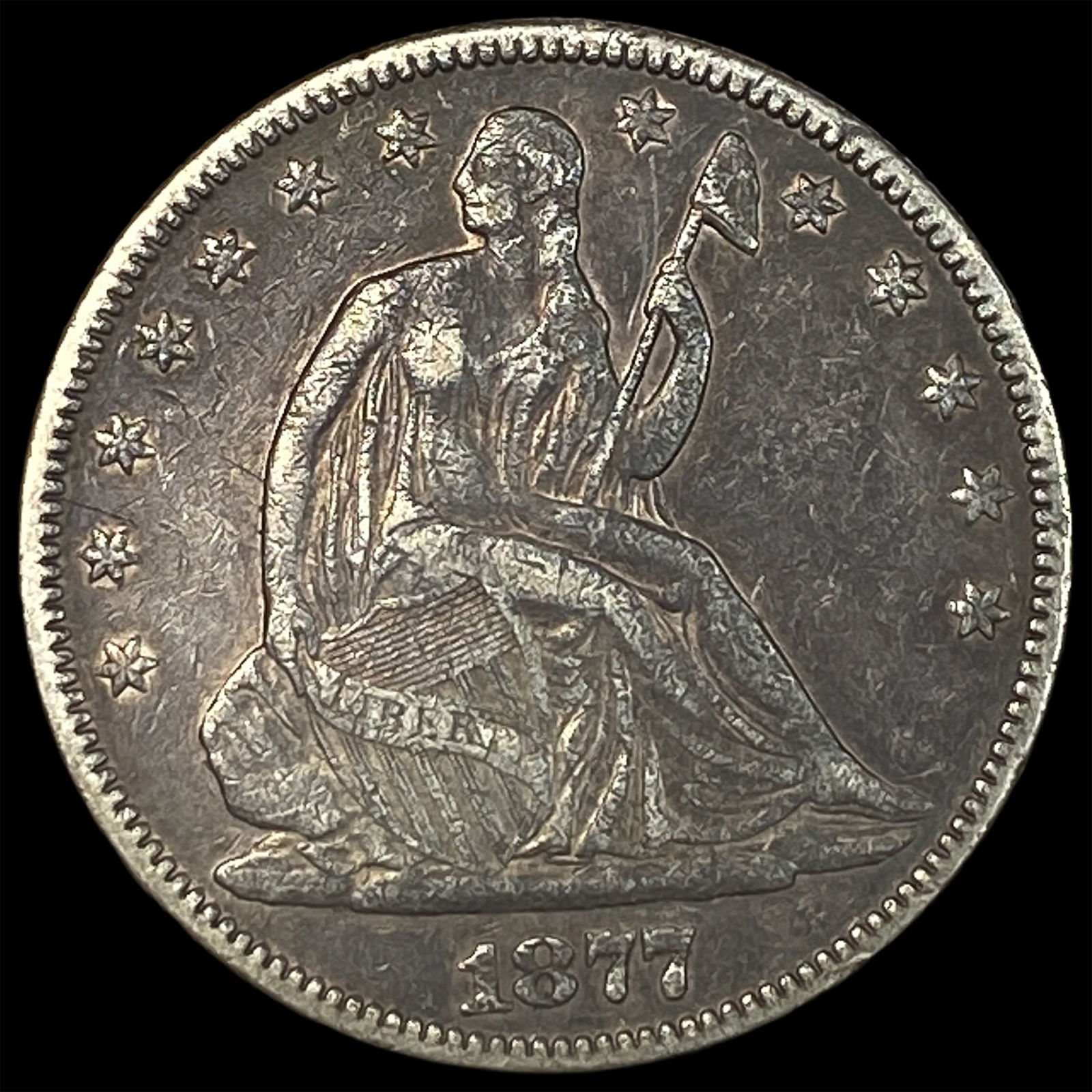1877 Seated Liberty Half Dollar ABOUT UNCIRCULATED: 1877 Seated Liberty Half Dollar ABOUT UNCIRCULATED