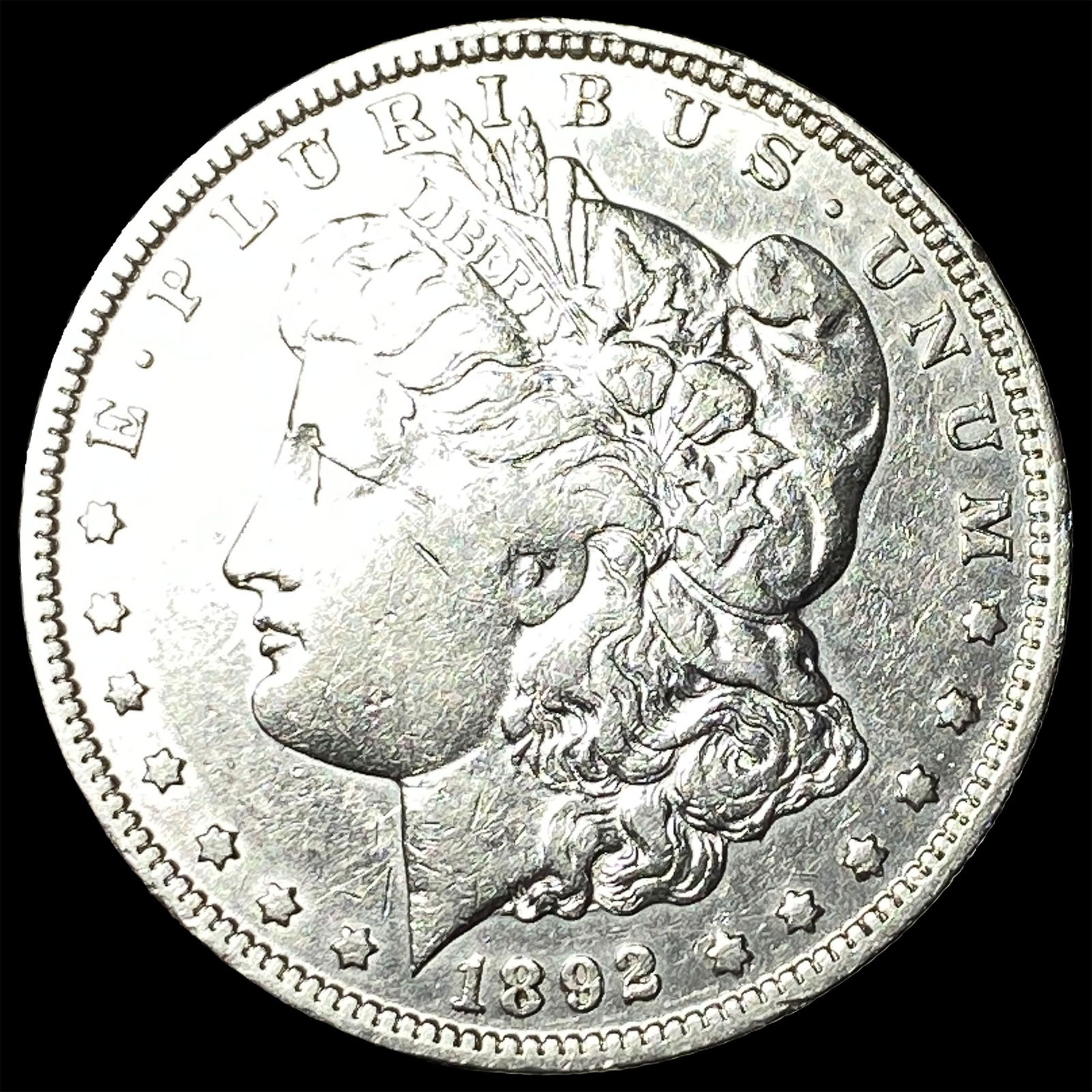 1892-O Morgan Silver Dollar NEARLY UNCIRCULATED (1 of 2)