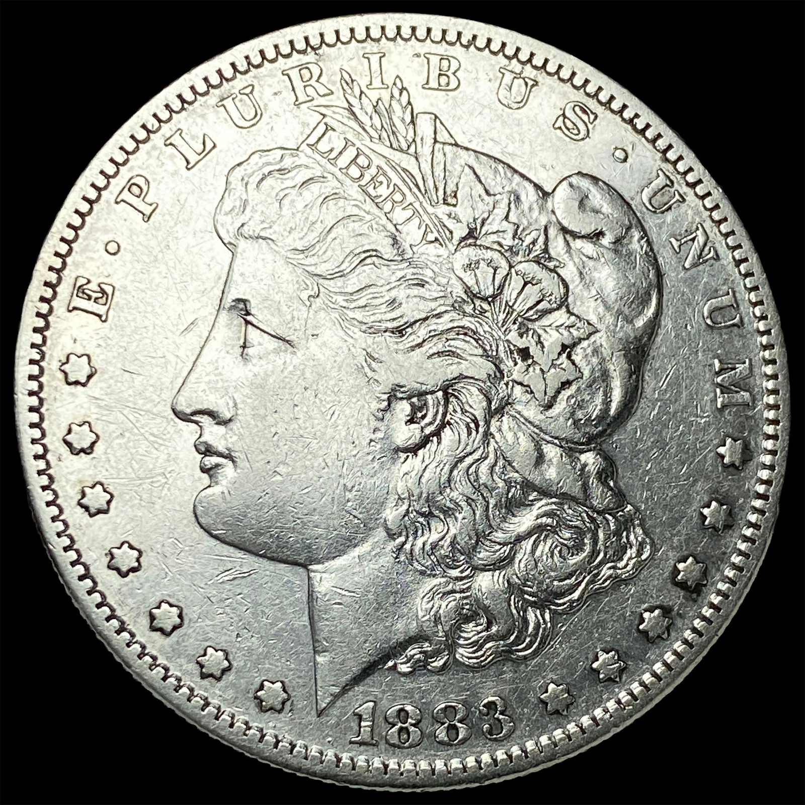 1883-S Silver Morgan Dollar ABOUT UNCIRCULATED (1 of 2)