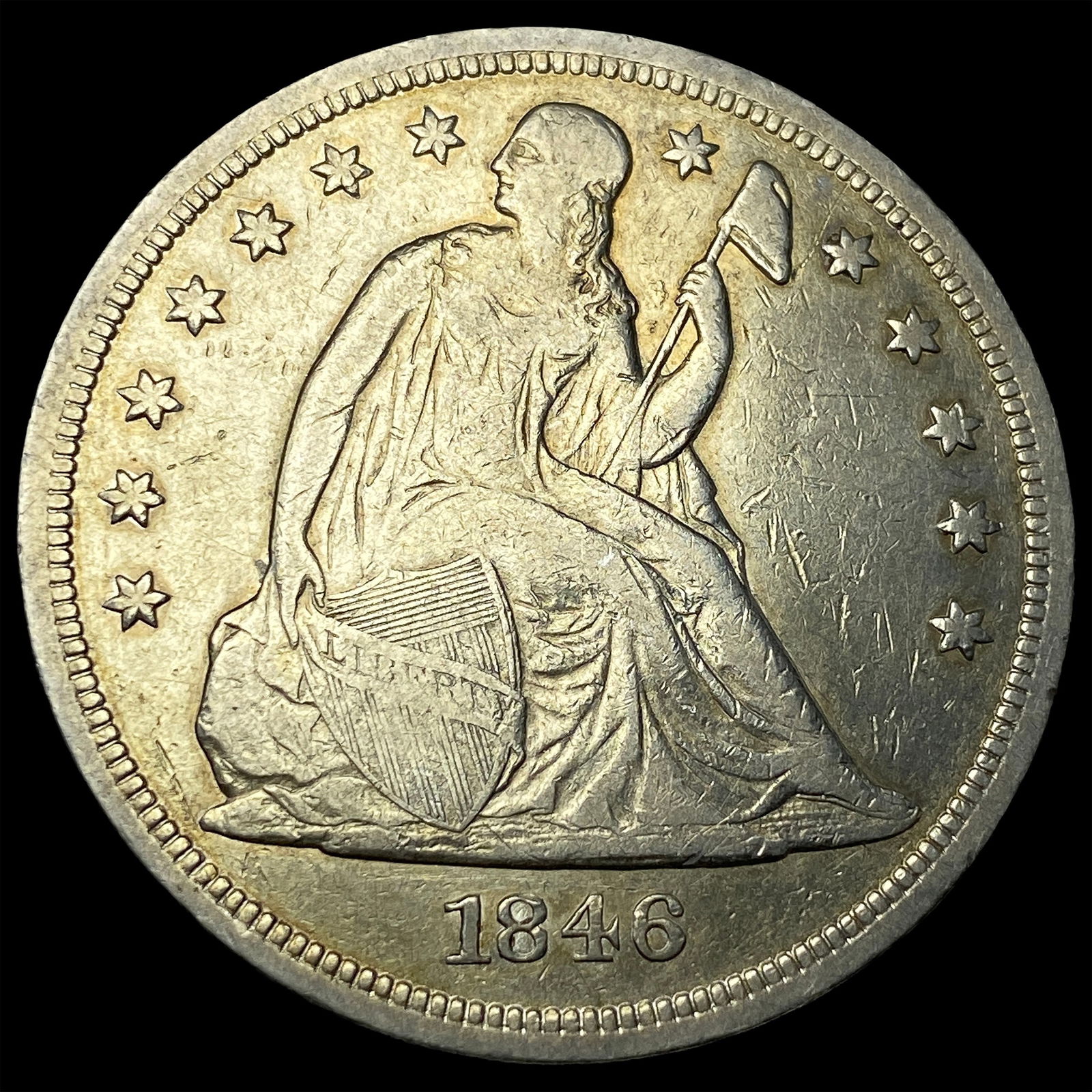 1846 Silver Seated Liberty Dollar NEARLY UNCIRCULATED: 1846 Silver Seated Liberty Dollar NEARLY UNCIRCULATED
