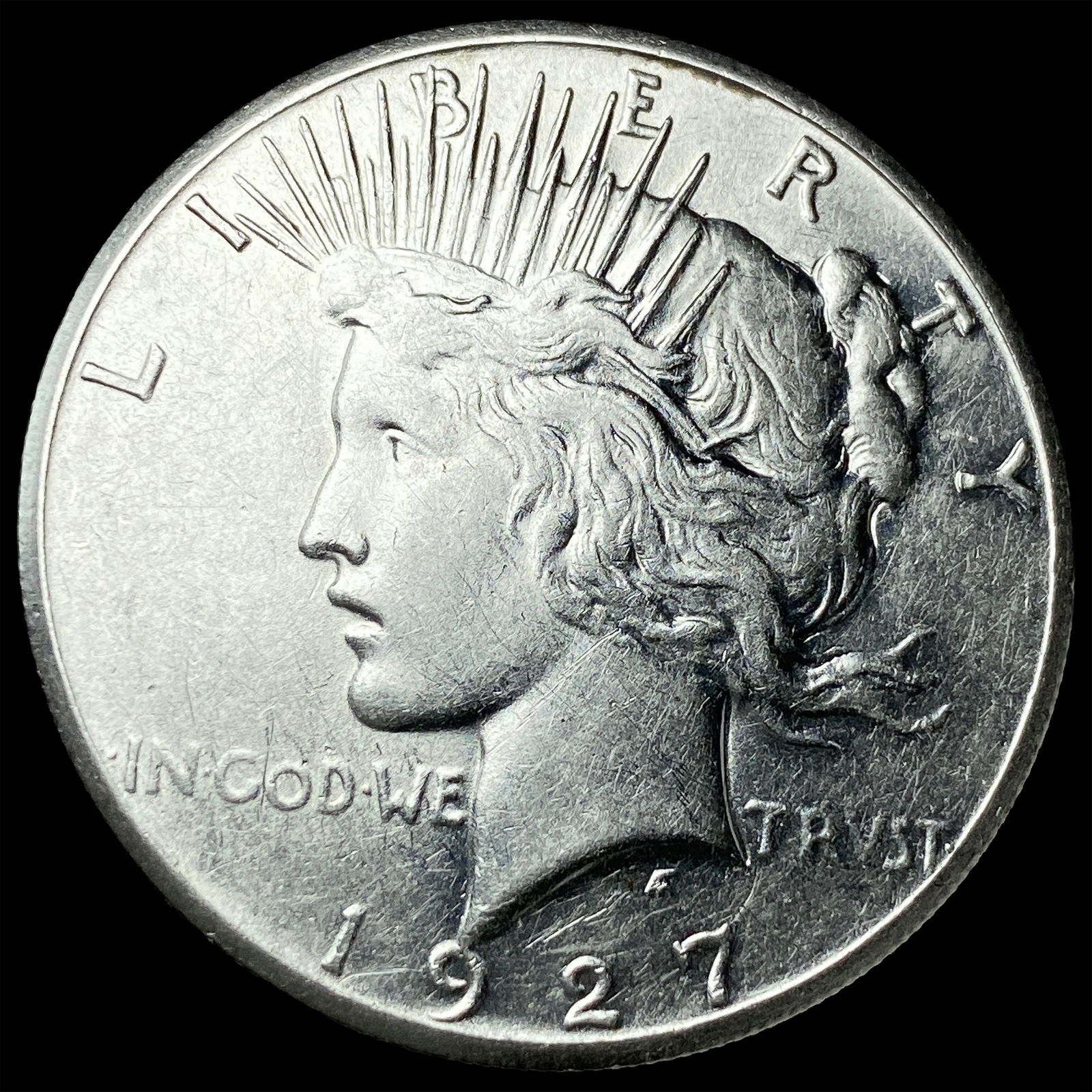 1927 Peace Silver Dollar CLOSELY UNCIRCULATED (1 of 2)