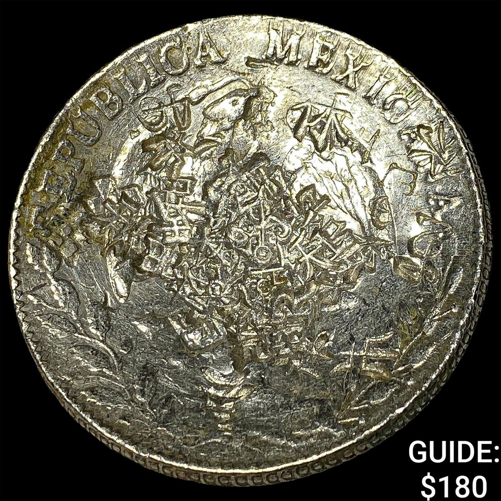 Mexico Silver 1 Peso Punchmarked NEARLY UNCIRCULATED (1 of 2)