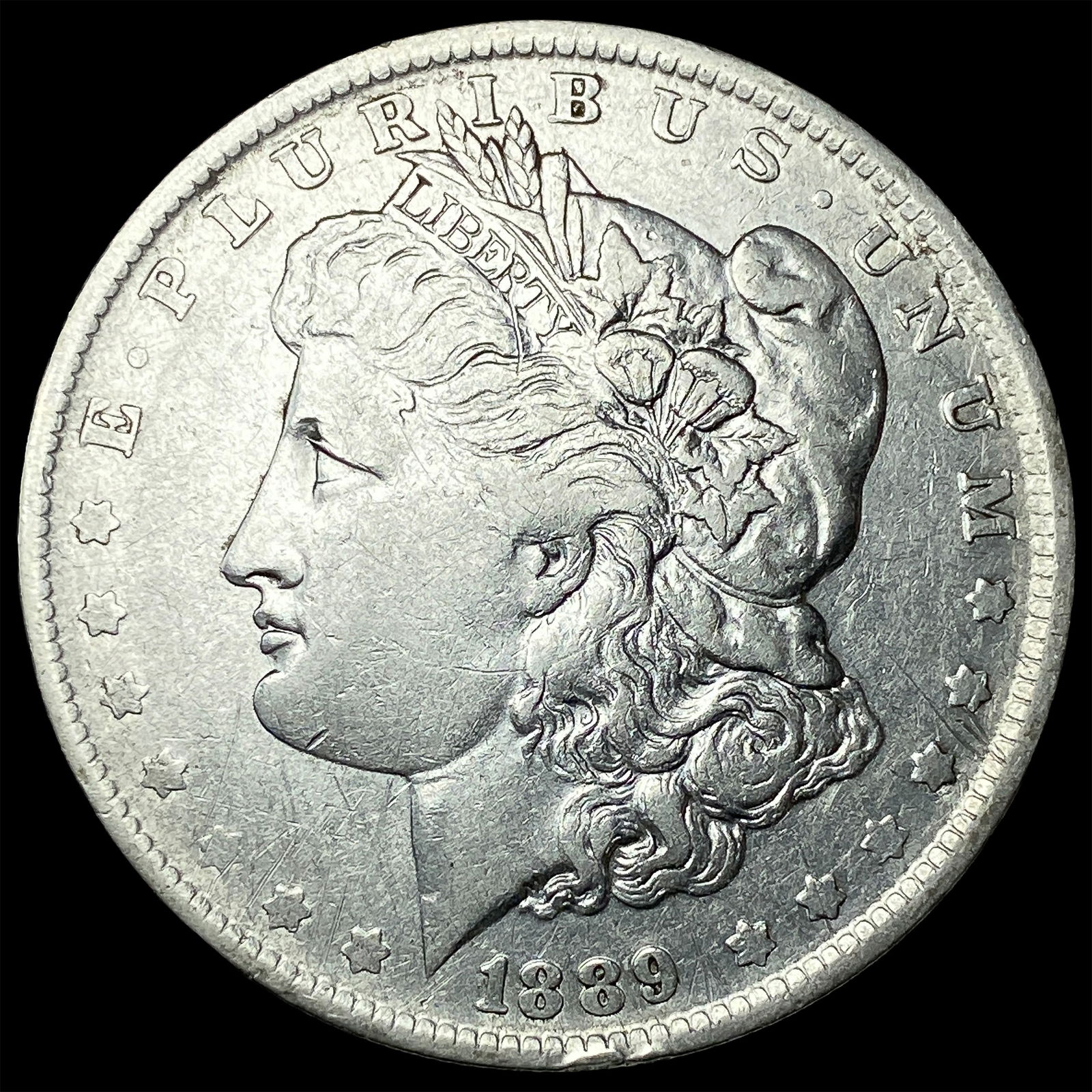 1889-O Silver Morgan Dollar ABOUT UNCIRCULATED: 1889-O Silver Morgan Dollar ABOUT UNCIRCULATED