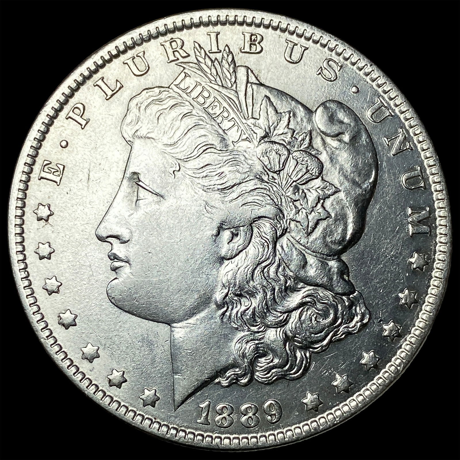 1889-O Silver Morgan Dollar CLOSELY UNCIRCULATED (1 of 2)