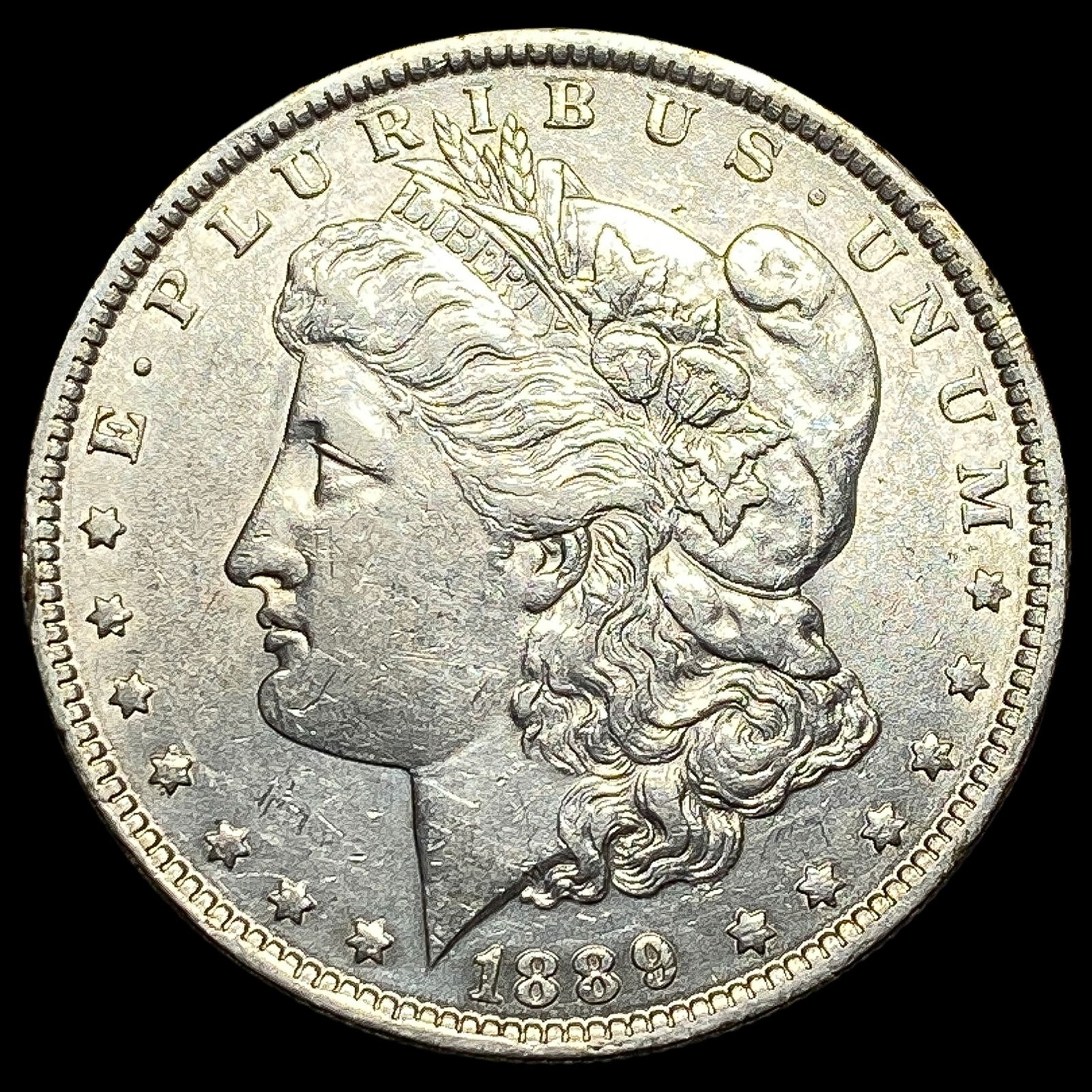 1889-O Silver Morgan Dollar CLOSELY UNCIRCULATED (1 of 2)