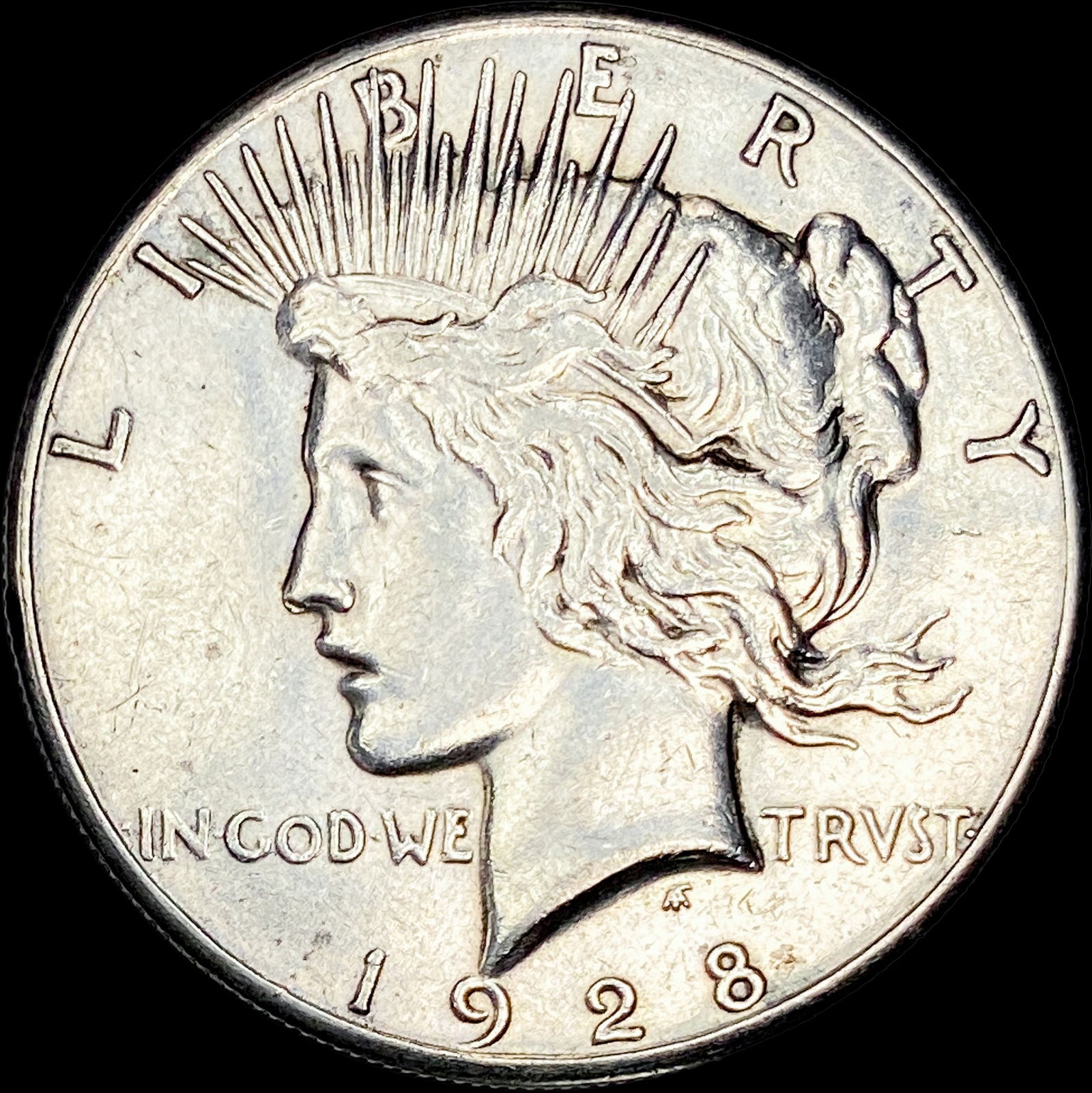 1928 Silver Peace Dollar CLOSELY UNCIRCULATED (1 of 2)