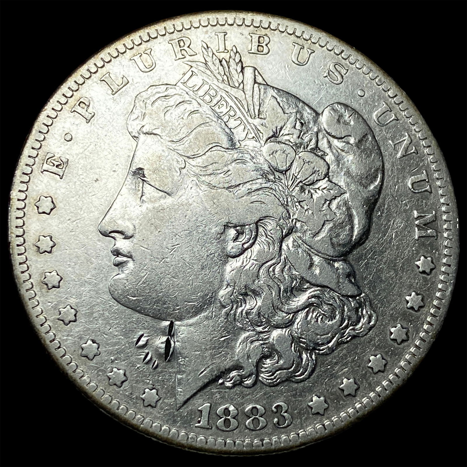 1883-S Silver Morgan Dollar ABOUT UNCIRCULATED: 1883-S Silver Morgan Dollar ABOUT UNCIRCULATED