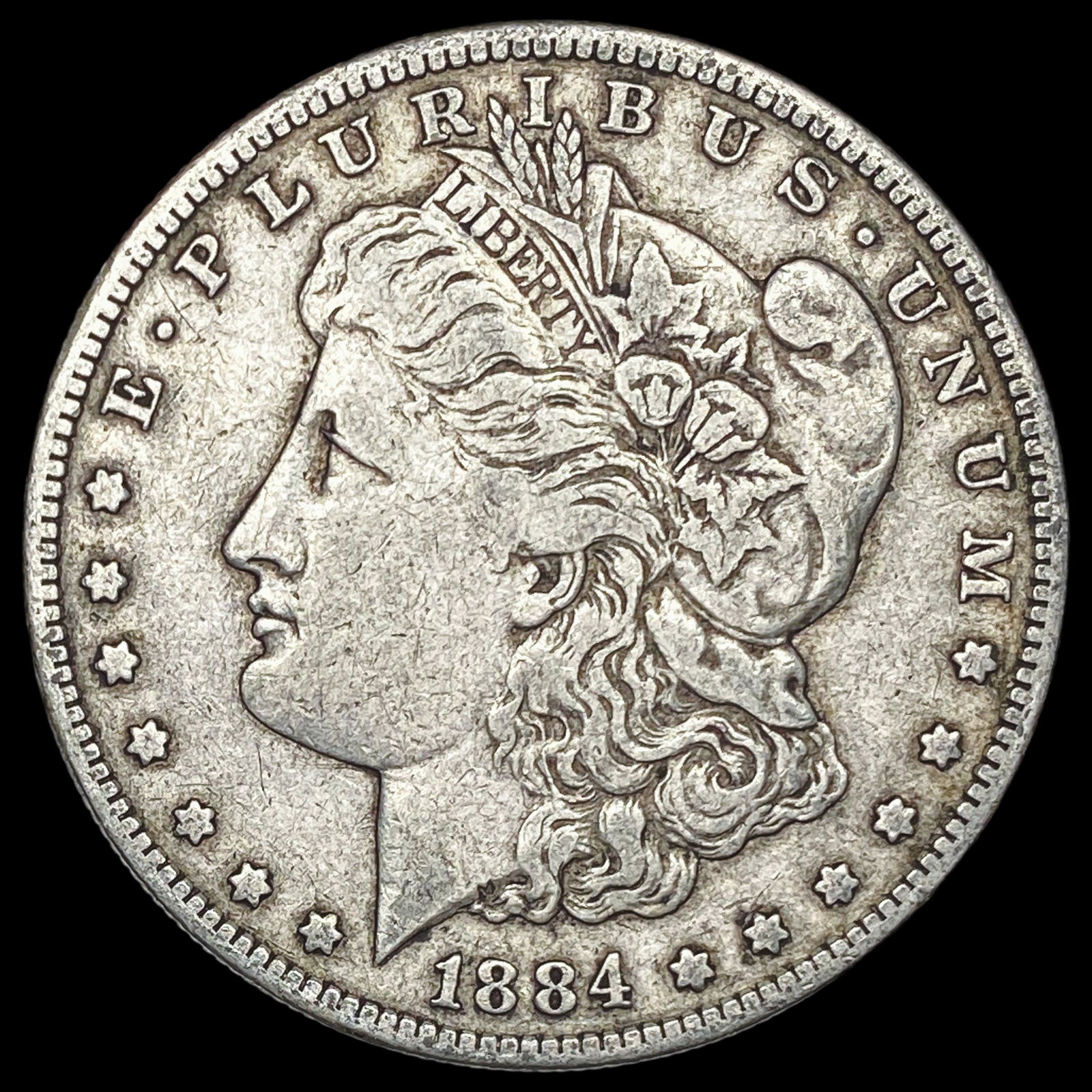 1884-S Silver Morgan Dollar ABOUT UNCIRCULATED: 1884-S Silver Morgan Dollar ABOUT UNCIRCULATED