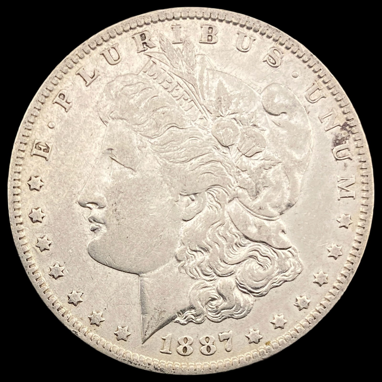 1887-O Silver Morgan Dollar CLOSELY UNCIRCULATED: 1887-O Silver Morgan Dollar CLOSELY UNCIRCULATED