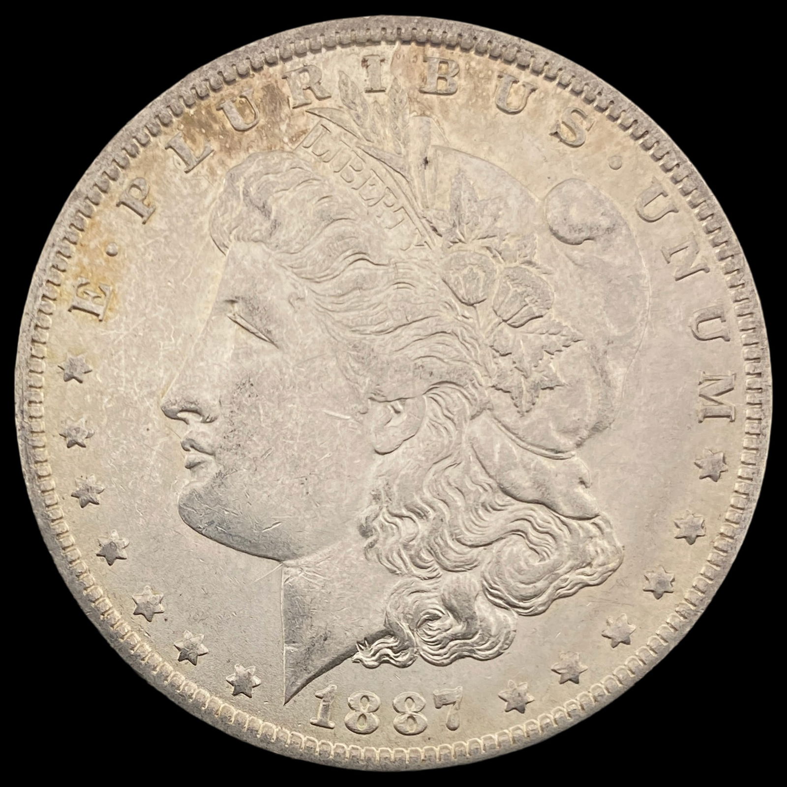 1887-O Silver Morgan Dollar CLOSELY UNCIRCULATED: 1887-O Silver Morgan Dollar CLOSELY UNCIRCULATED