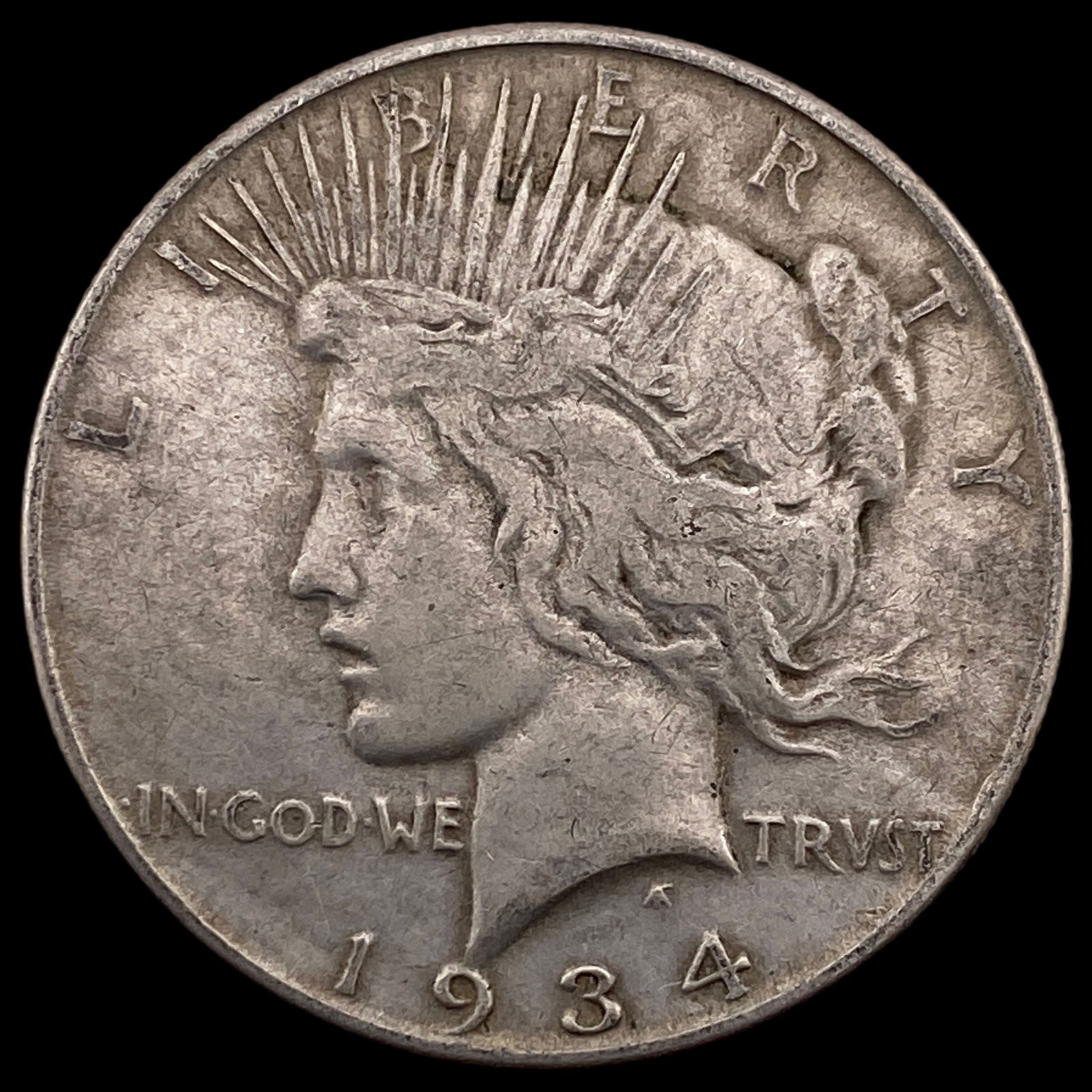 1934 Peace Silver Dollar NEARLY UNCIRCULATED (1 of 2)