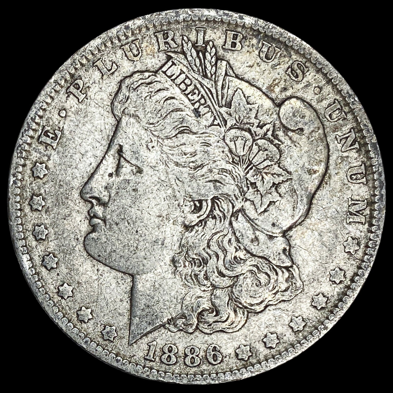 1886-O Silver Morgan Dollar ABOUT UNCIRCULATED: 1886-O Silver Morgan Dollar ABOUT UNCIRCULATED