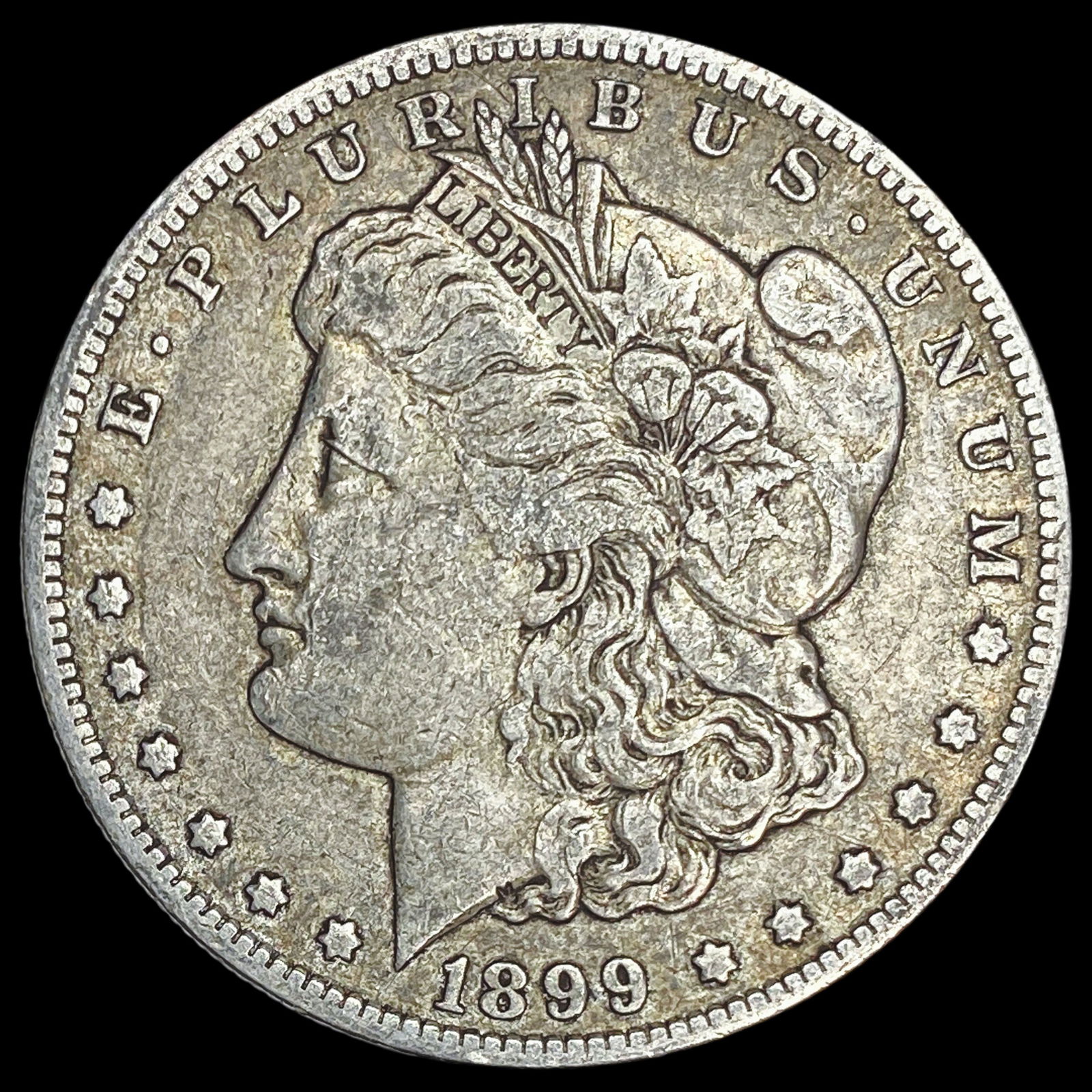 1899-O Micro O Morgan Silver Dollar ABOUT UNCIRCULATED: 1899-O Micro O Morgan Silver Dollar ABOUT UNCIRCULATED